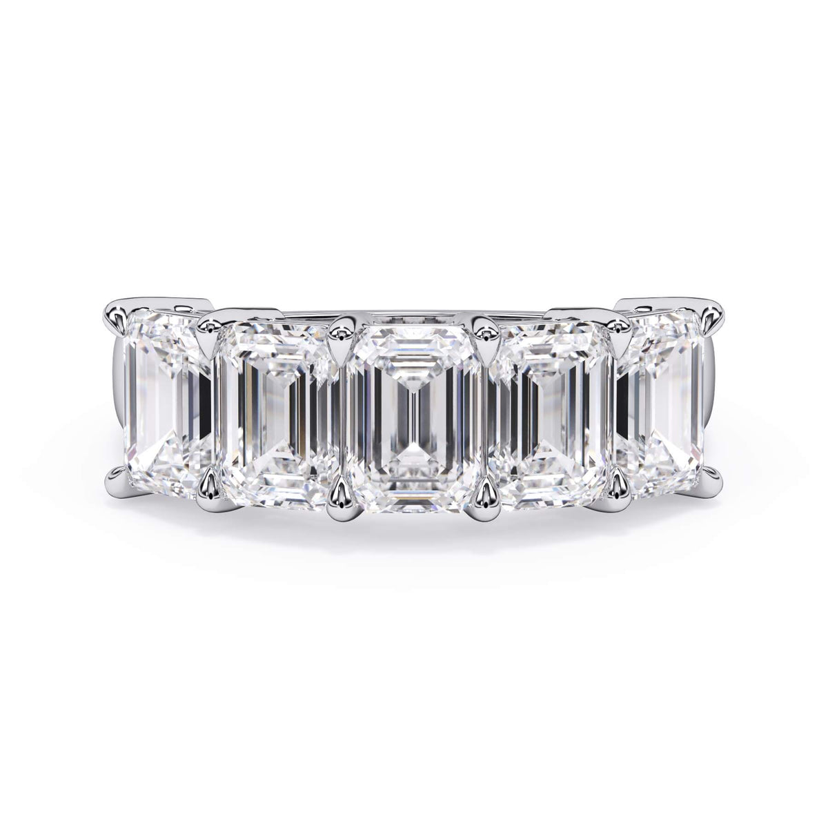 A picture of a five stone diamond wedding ring with emerald cut diamonds that are shared prong set in white gold or platinum on a white background with the ring facing forward, lying down.