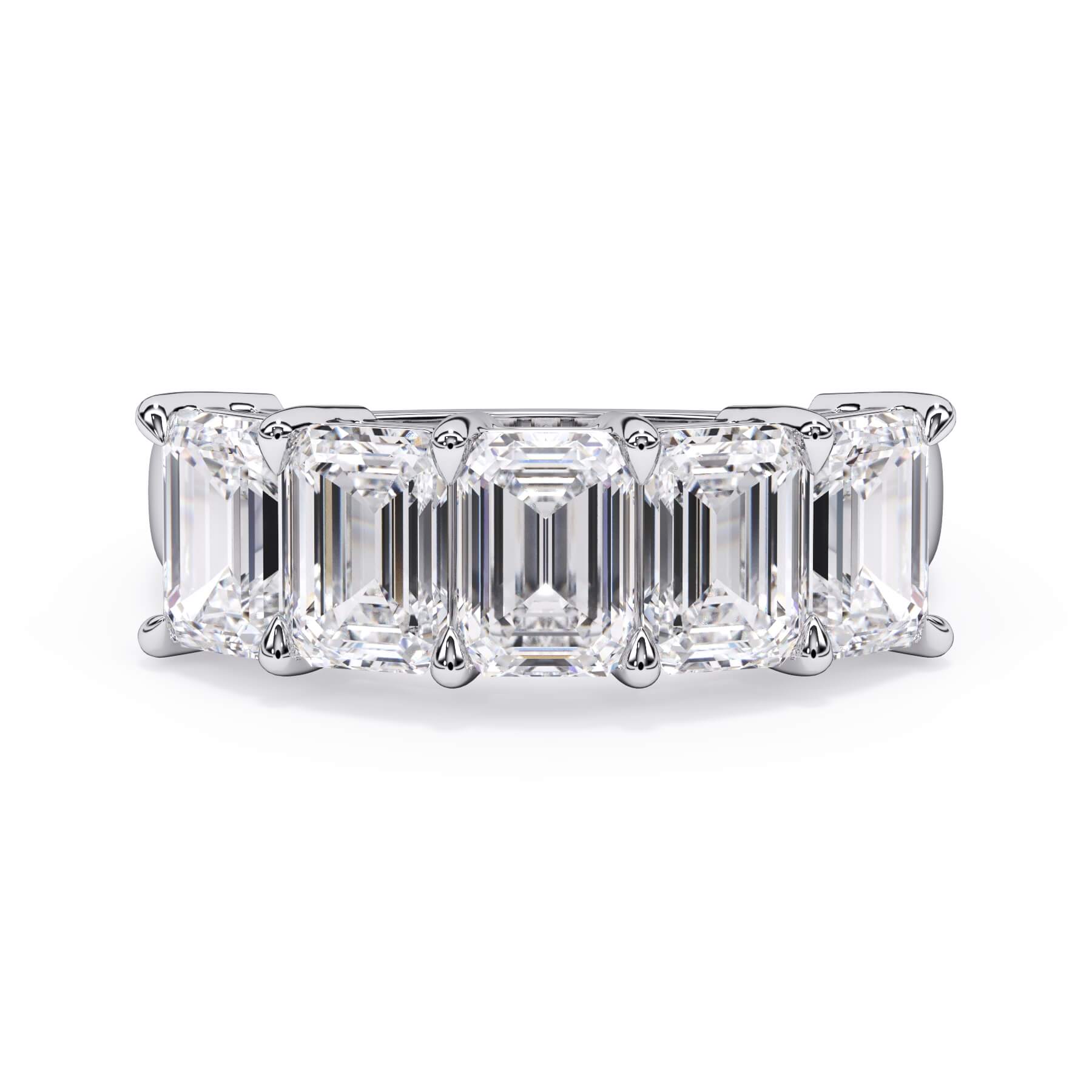 A picture of a five stone diamond wedding ring with emerald cut diamonds that are shared prong set in white gold or platinum on a white background with the ring facing forward, lying down.