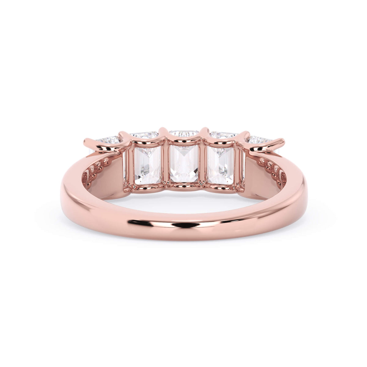 A picture of a five stone diamond wedding ring with emerald cut diamonds that are u prong set in rose gold on a white background with a view of the underside of the ring.