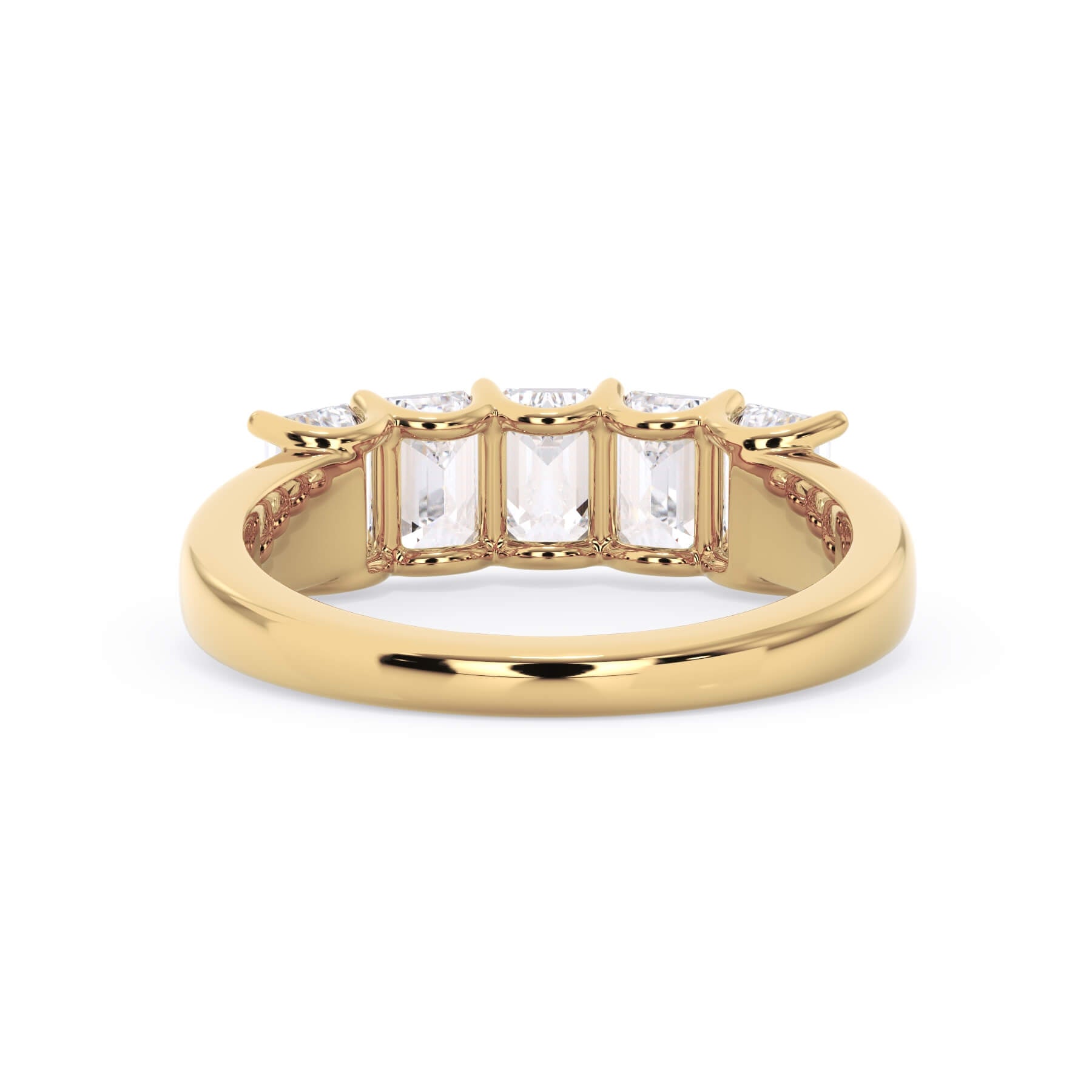 A picture of a five stone diamond wedding ring with emerald cut diamonds that are u prong set in yellow gold on a white background with a view of the underside of the ring.