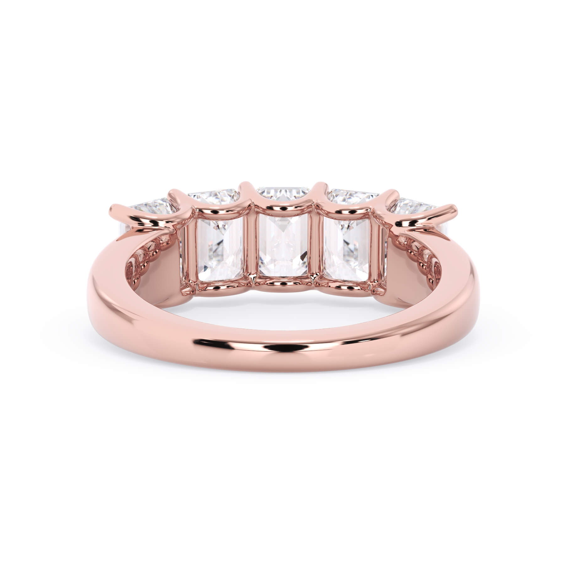 A picture of a five stone diamond wedding ring with emerald cut diamonds that are u prong set in rose gold on a white background with a view of the underside of the ring.