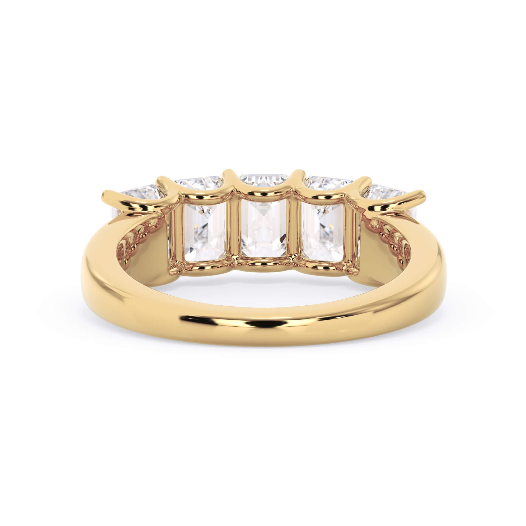 A picture of a five stone diamond wedding ring with emerald cut diamonds that are u prong set in yellow gold on a white background with a view of the underside of the ring.