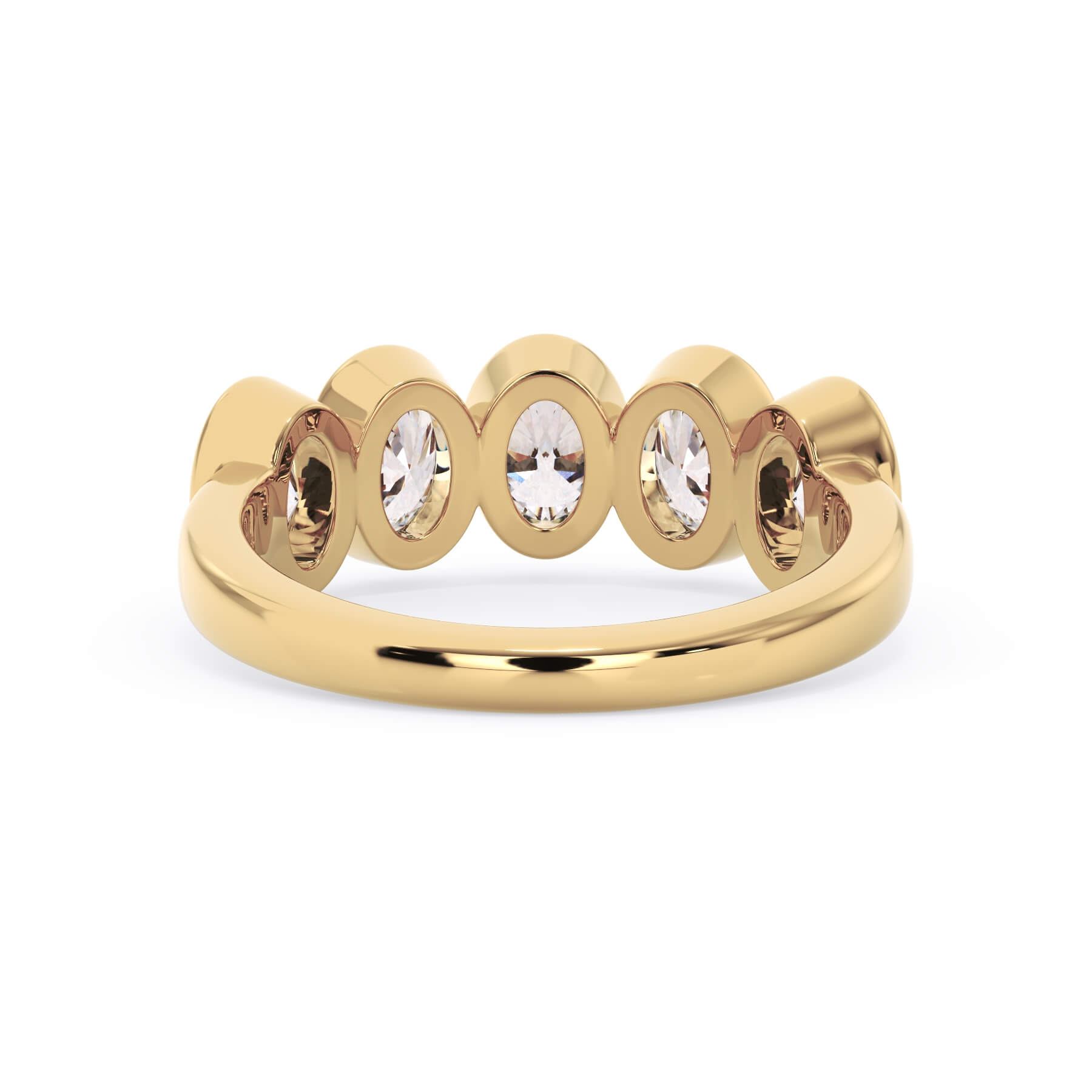 A picture of a five stone diamond wedding ring with oval shape diamonds that are bezel set in yellow gold on a white background with a view of the underside of the ring.