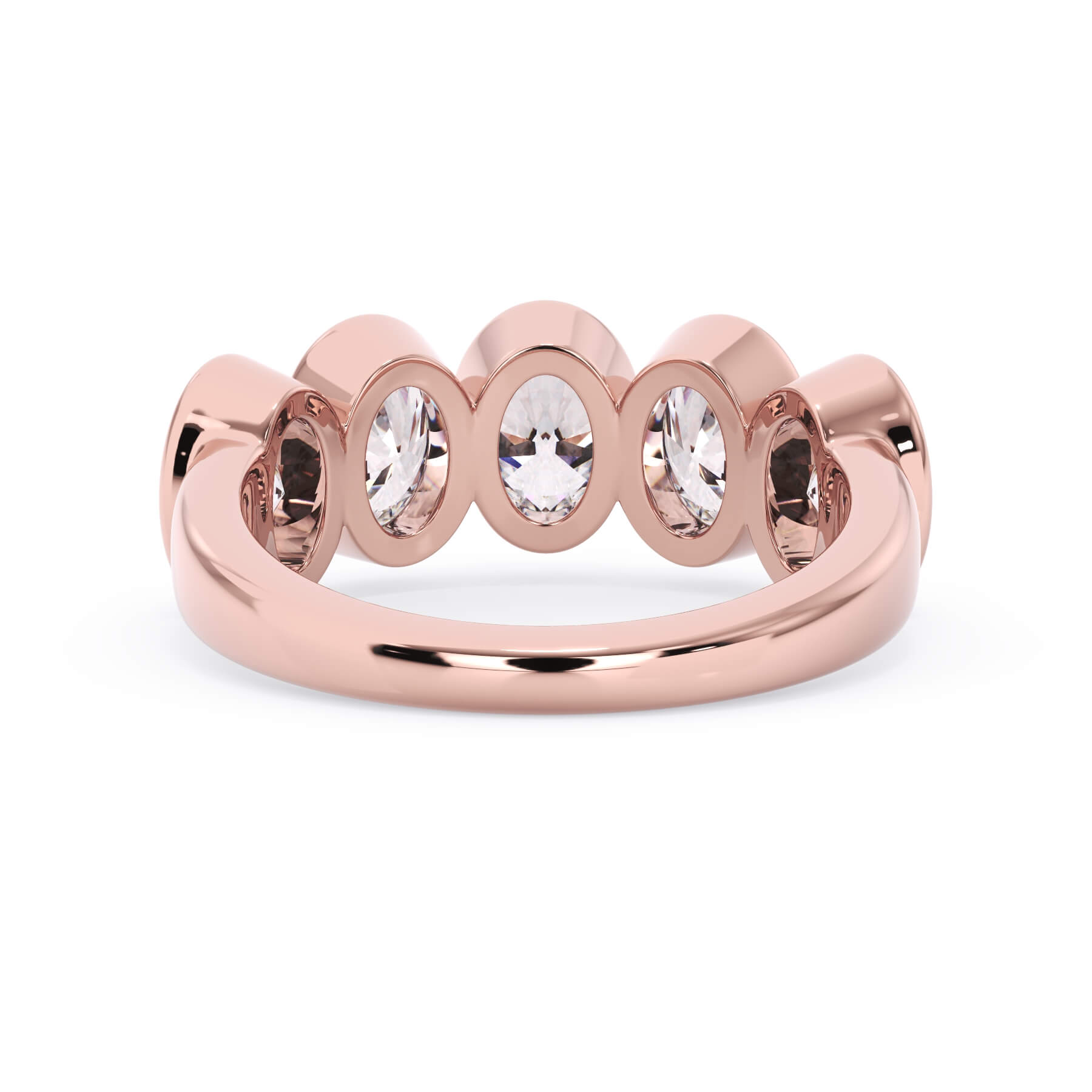 A picture of a five stone diamond wedding ring with oval shape diamonds that are bezel set in rose gold on a white background with a view of the underside of the ring.