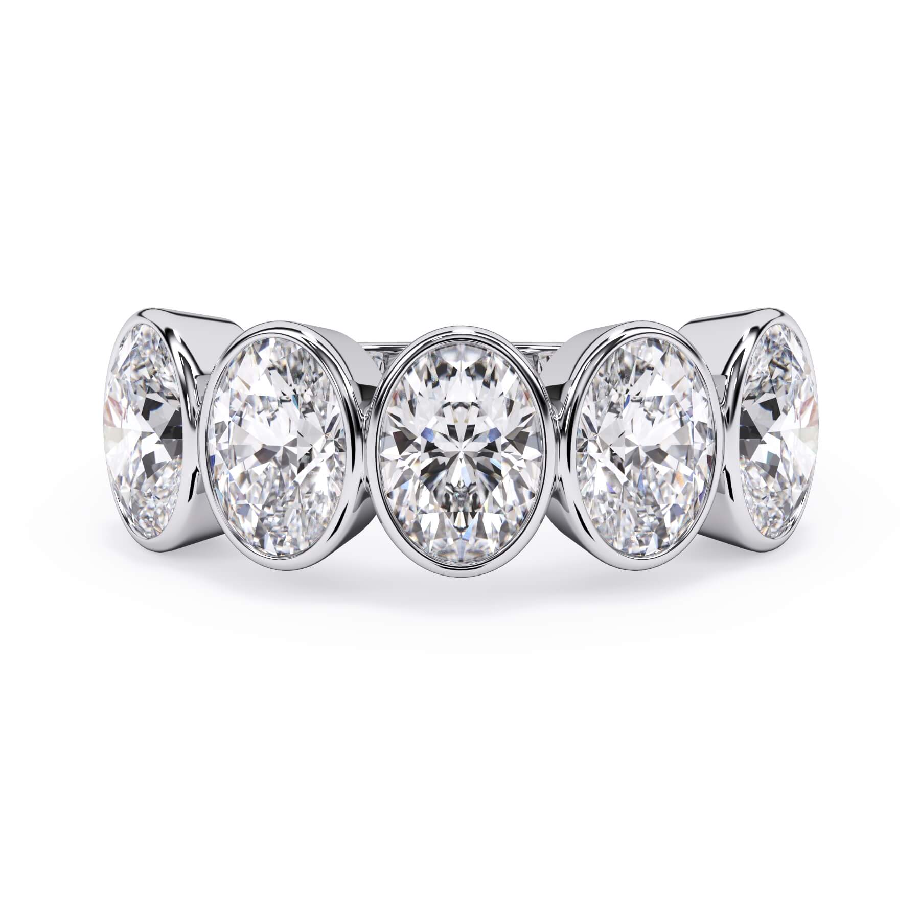 A picture of a five stone diamond wedding ring with oval shape diamonds that are bezel set in white gold or platinum on a white background with the ring facing forward, lying down.
