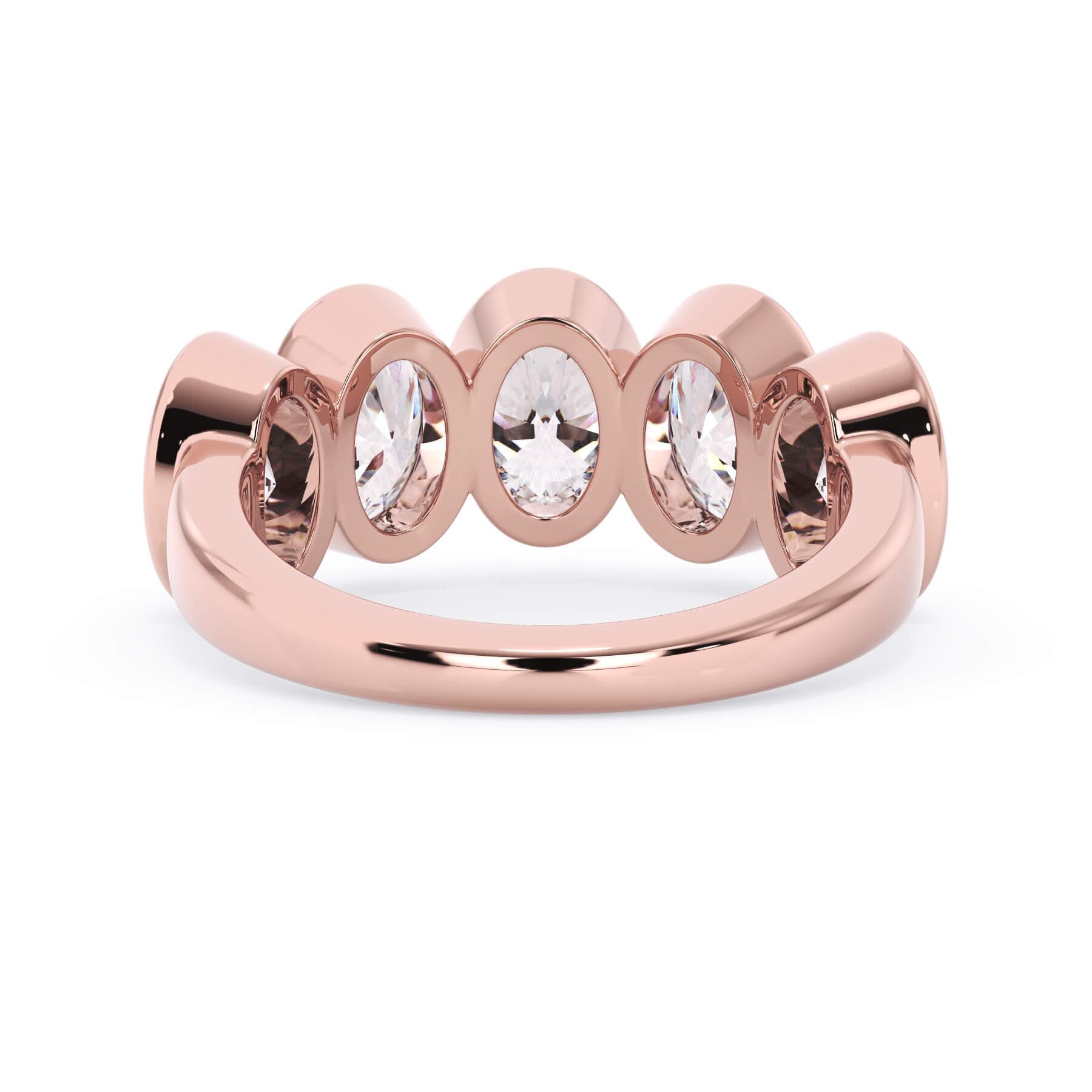 A picture of a five stone diamond wedding ring with oval shape diamonds that are bezel set in rose gold on a white background with a view of the underside of the ring.