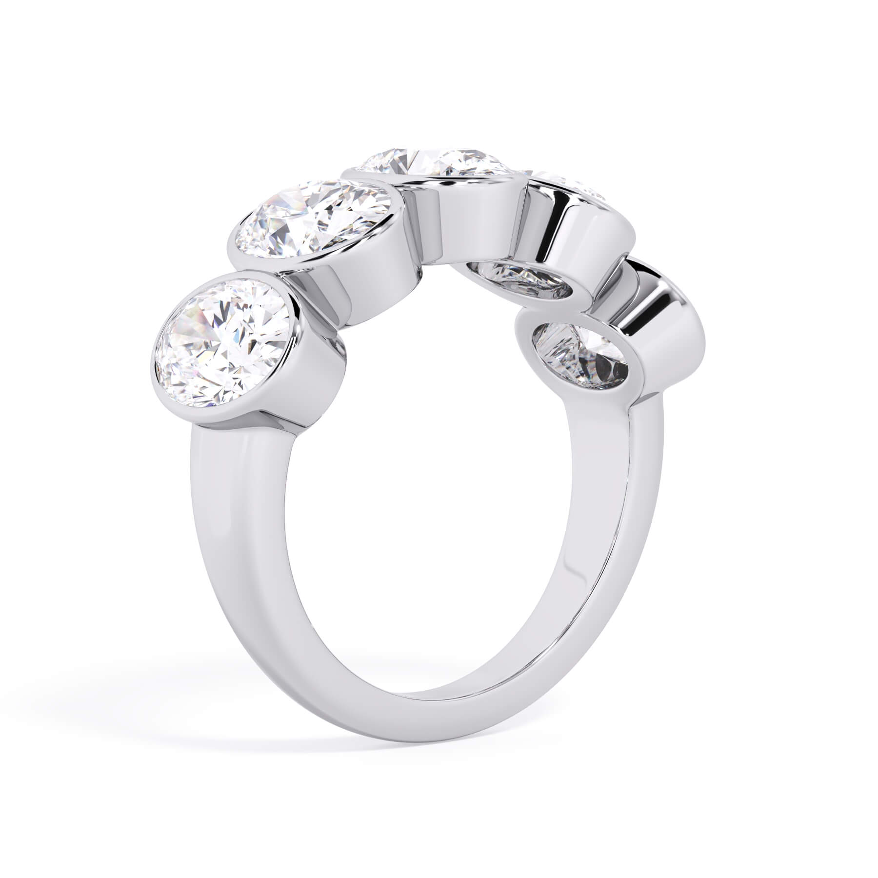 A picture of a five stone diamond wedding ring with oval shape diamonds that are bezel set in white gold or platinum on a white background with a slightly angled, through the finger view.