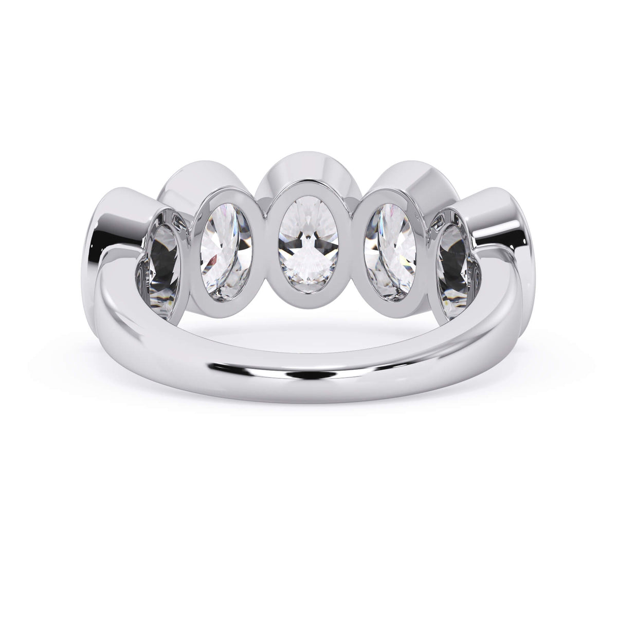 A picture of a five stone diamond wedding ring with oval shape diamonds that are bezel set in white gold or platinum on a white background with a view of the underside of the ring.