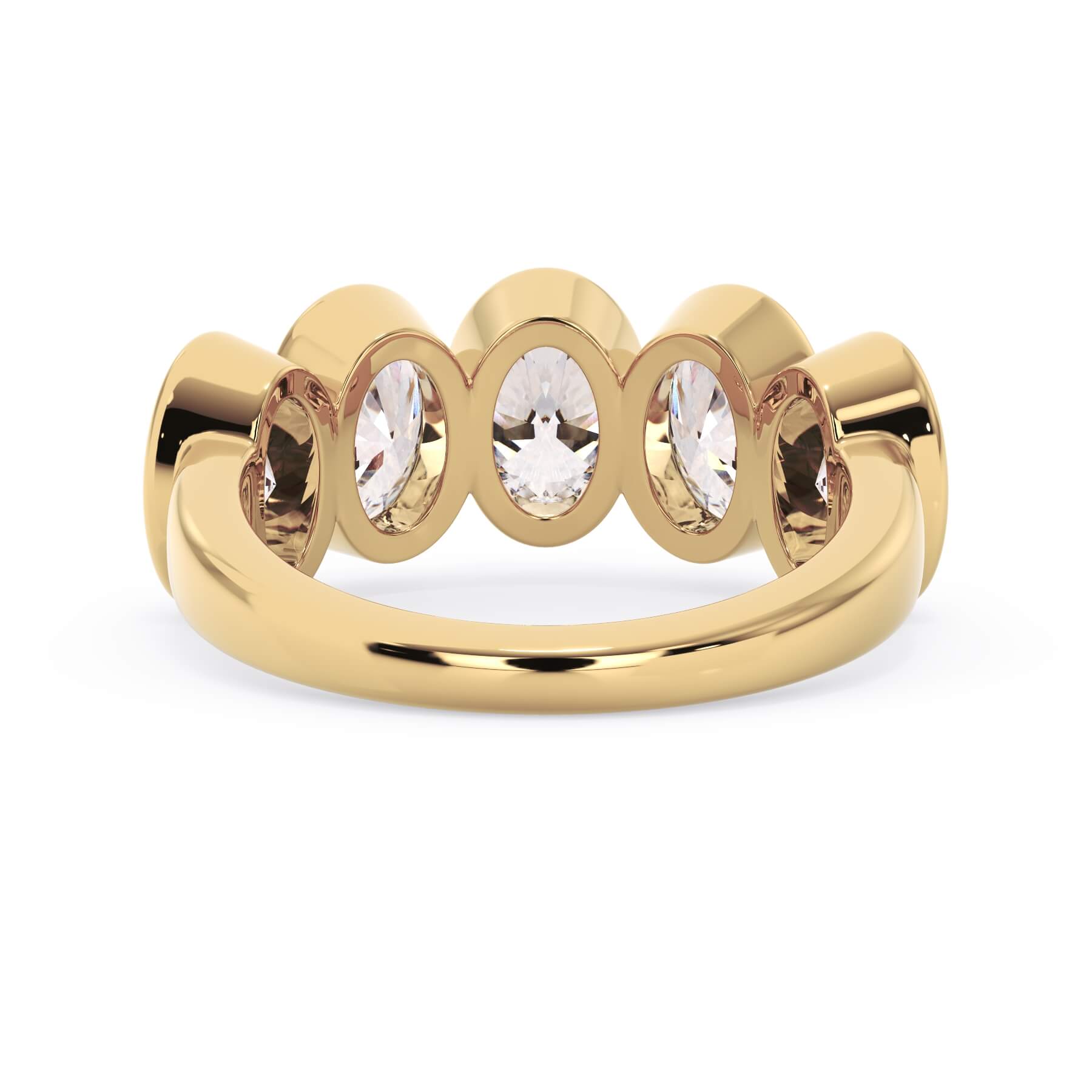A picture of a five stone diamond wedding ring with oval shape diamonds that are bezel set in yellow gold on a white background with a view of the underside of the ring.