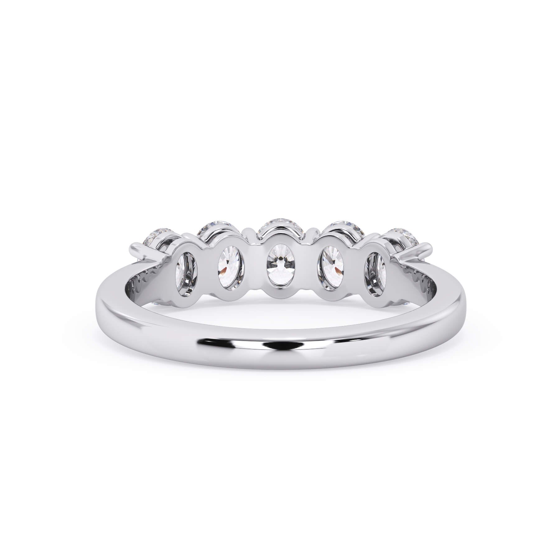 A picture of a five stone diamond wedding ring with oval shape diamonds that are shared prong set in white gold or platinum on a white background with a view of the underside of the ring.