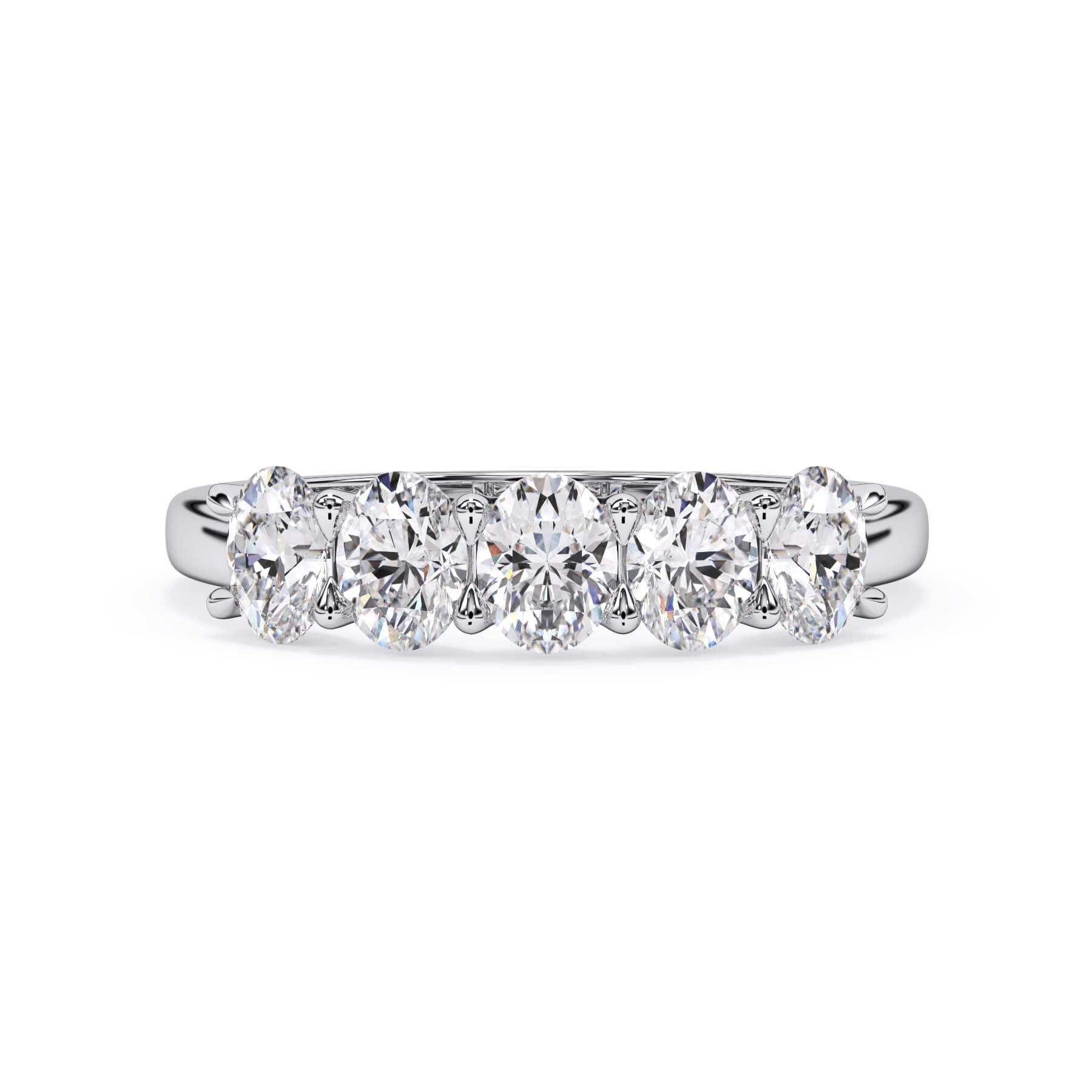 A picture of a five stone diamond wedding ring with oval shape diamonds that are u prong set in white gold or platinum on a white background with the ring facing forward, lying down.
