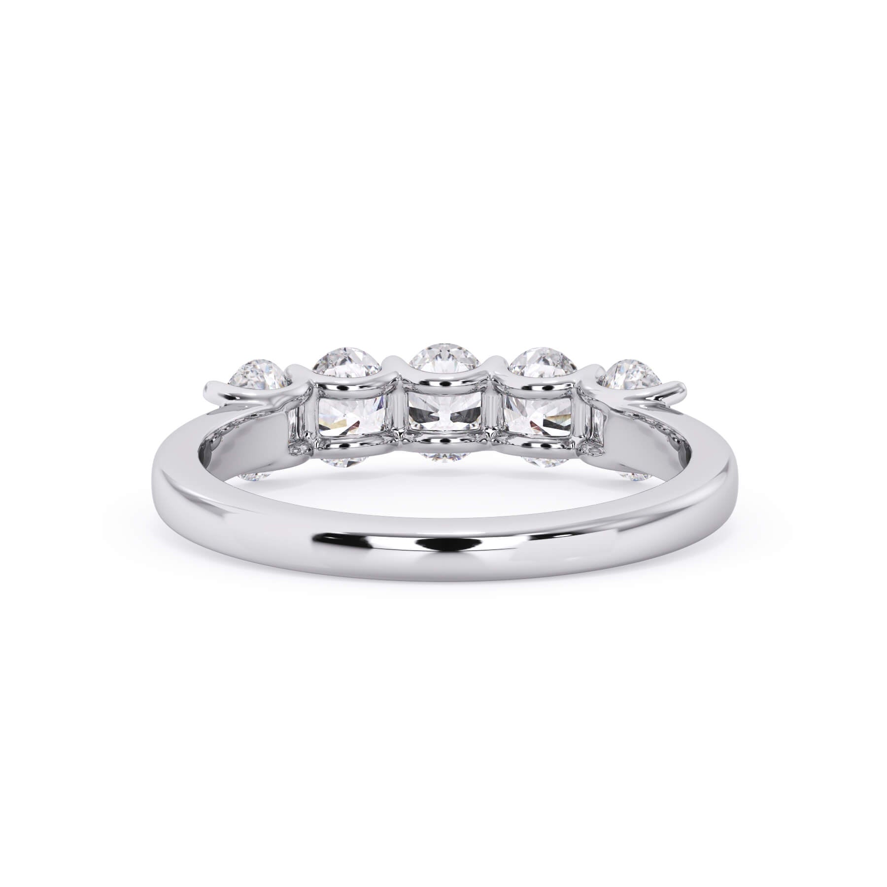 A picture of a five stone diamond wedding ring with oval shape diamonds that are u prong set in white gold or platinum on a white background with a view of the underside of the ring.
