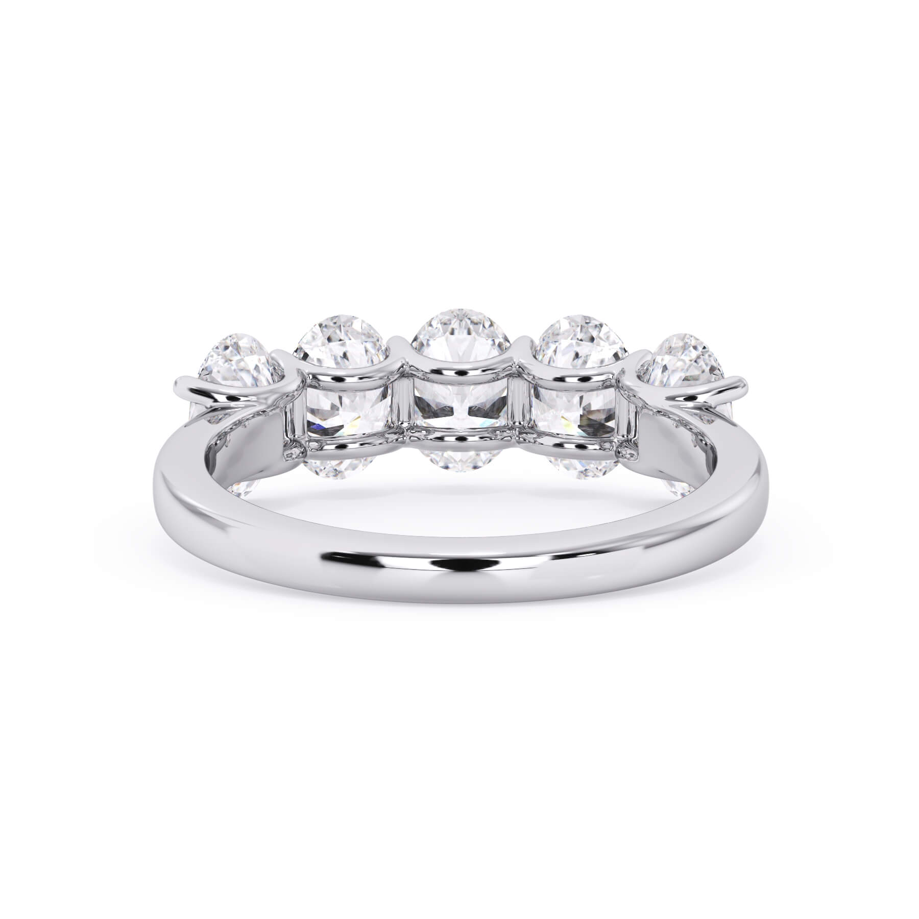 A picture of a five stone diamond wedding ring with oval shape diamonds that are u prong set in white gold or platinum on a white background with a view of the underside of the ring.
