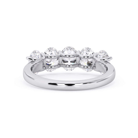 A picture of a five stone diamond wedding ring with oval shape diamonds that are u prong set in white gold or platinum on a white background with a view of the underside of the ring.