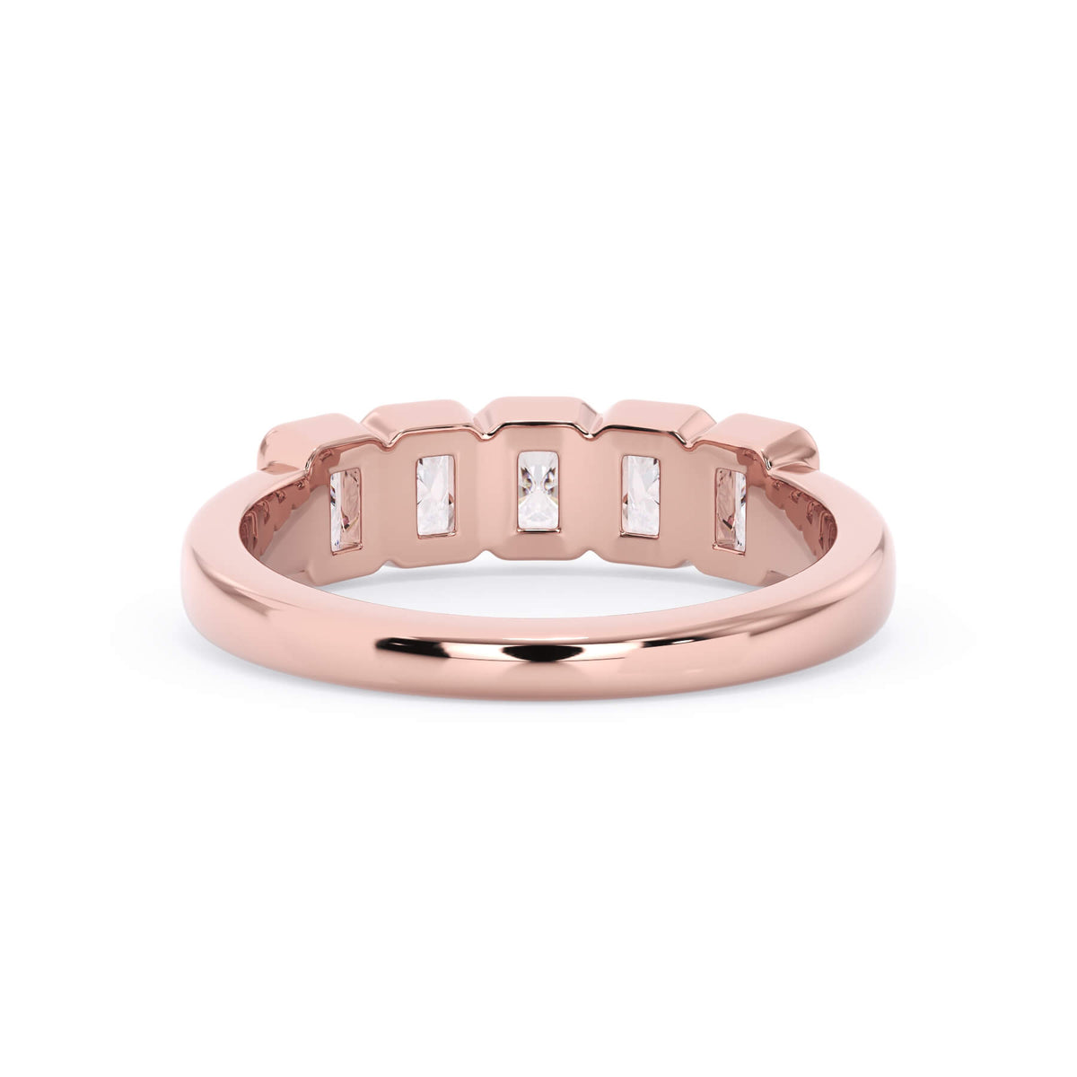 A picture of a five stone diamond wedding ring with radiant cut diamonds that are bezel set in rose gold on a white background with a view of the underside of the ring.