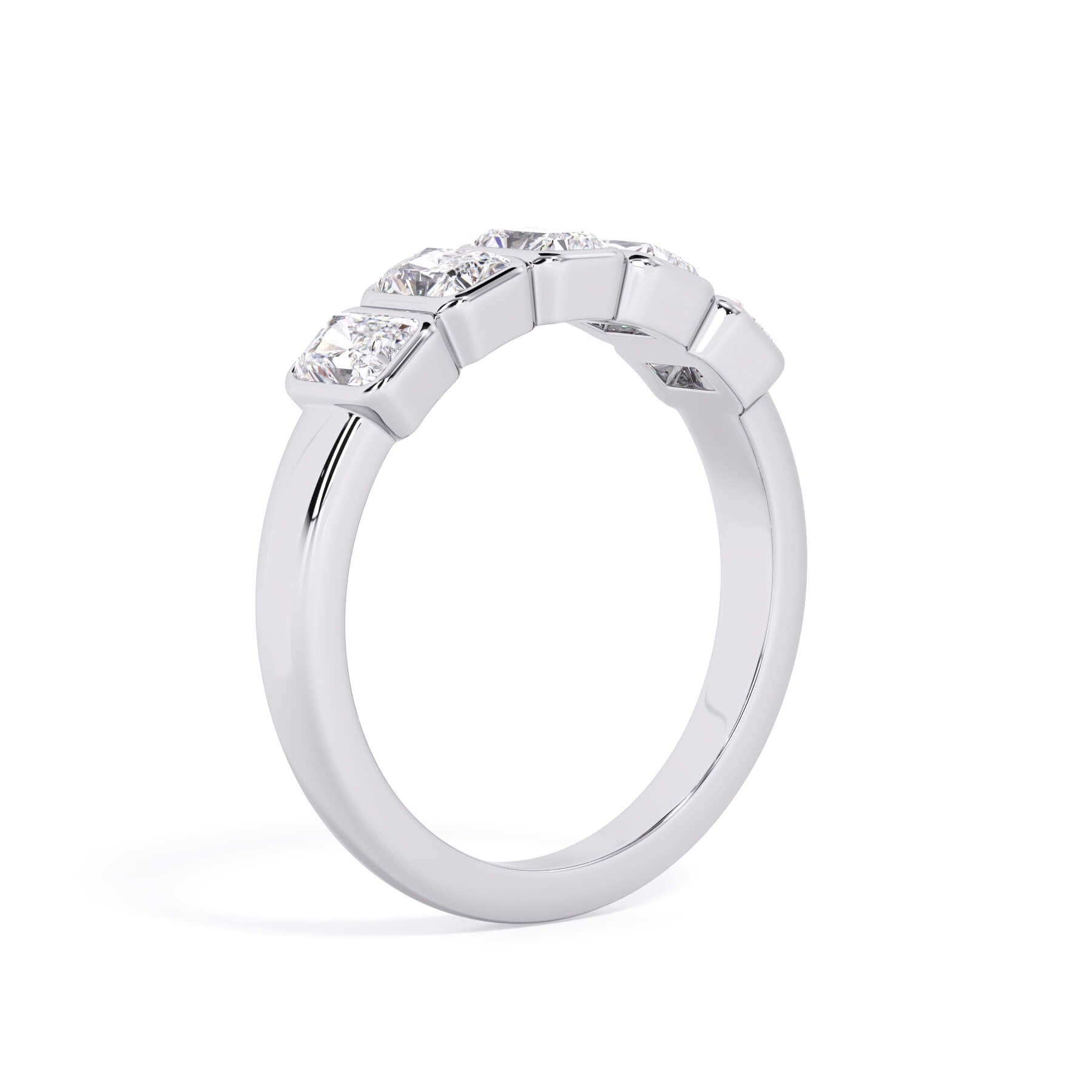 A picture of a five stone diamond wedding ring with radiant cut diamonds that are bezel set in white gold or platinum on a white background with a slightly angled, through the finger view.