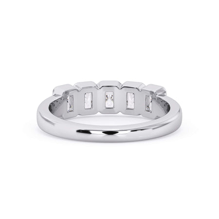 A picture of a five stone diamond wedding ring with radiant cut diamonds that are bezel set in white gold or platinum on a white background with a view of the underside of the ring.