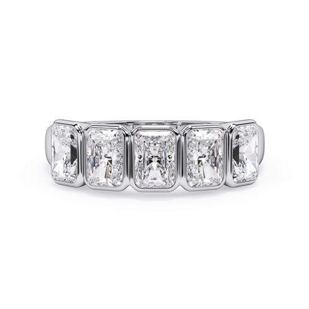 A picture of a five stone diamond wedding ring with radiant cut diamonds that are bezel set in white gold or platinum on a white background with the ring facing forward, lying down.