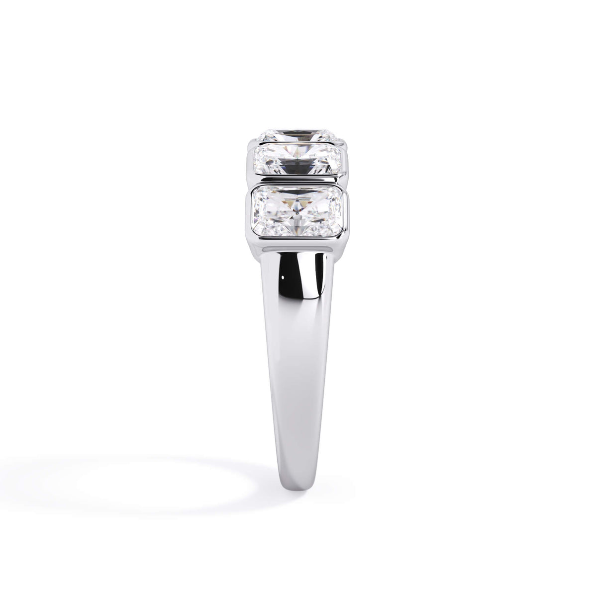 A picture of a five stone diamond wedding ring with radiant cut diamonds that are bezel set in white gold or platinum on a white background with a side profile view.