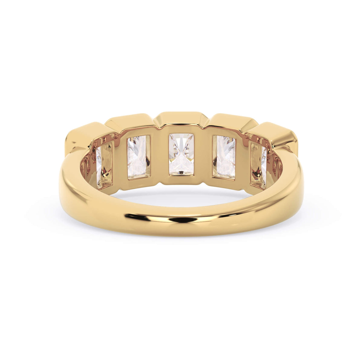 A picture of a five stone diamond wedding ring with radiant cut diamonds that are bezel set in yellow gold on a white background with a view of the underside of the ring.