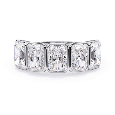 A picture of a five stone diamond wedding ring with radiant cut diamonds that are bezel set in white gold or platinum on a white background with the ring facing forward, lying down.