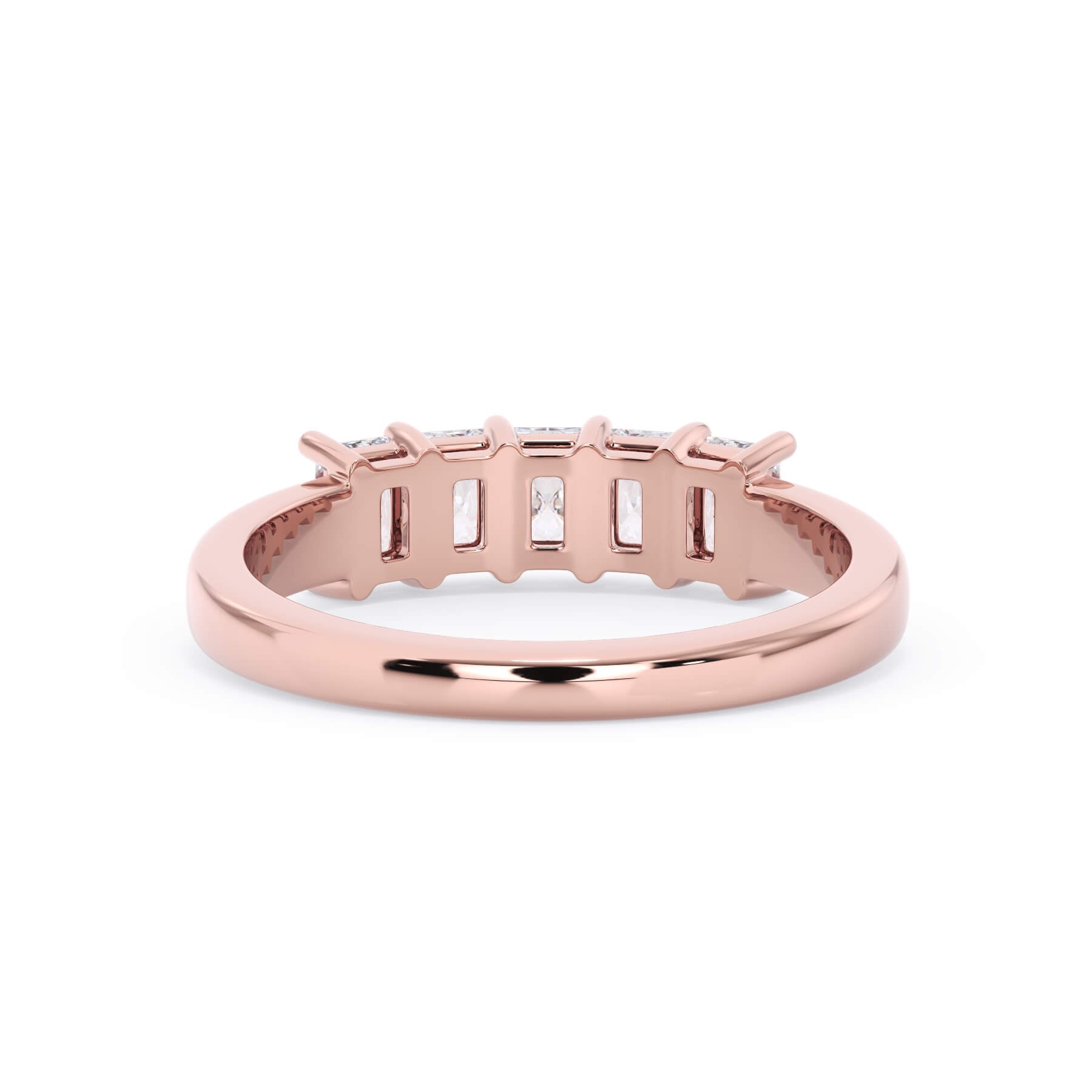 A picture of a five stone diamond wedding ring with radiant cut diamonds that are shared prong set in rose gold on a white background with a view of the underside of the ring.