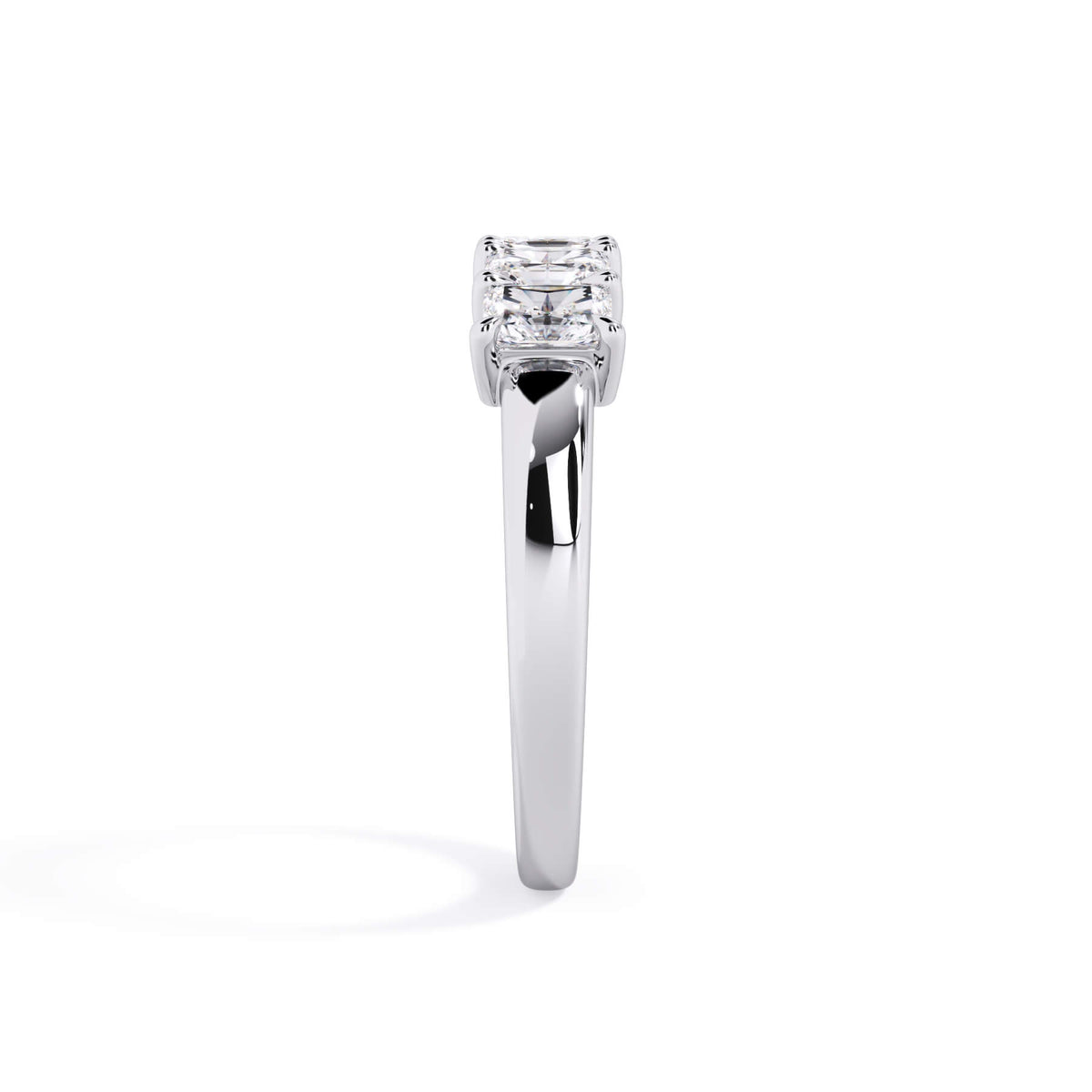 A picture of a five stone diamond wedding ring with radiant cut diamonds that are shared prong set in white gold or platinum on a white background with a side profile view.