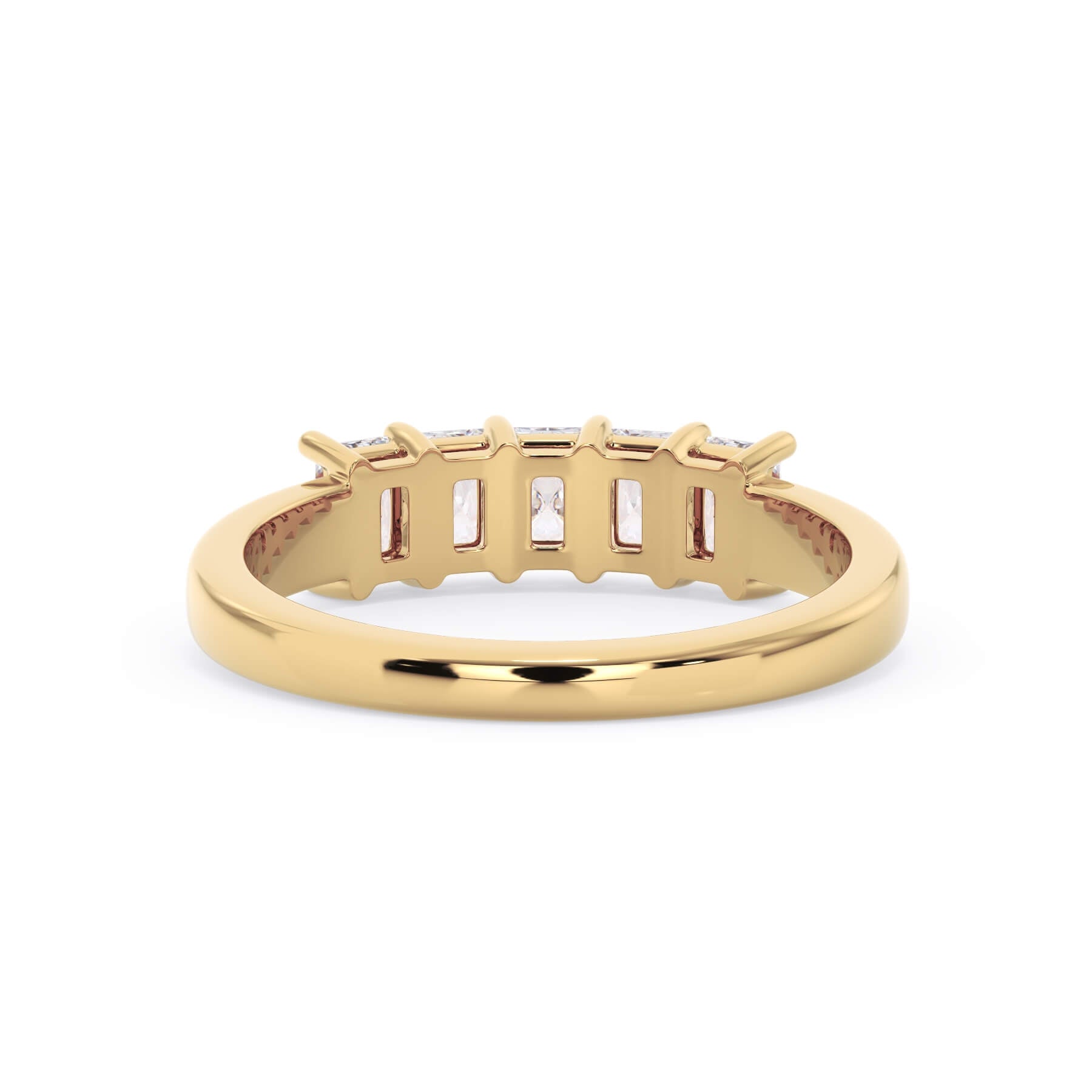 A picture of a five stone diamond wedding ring with radiant cut diamonds that are shared prong set in yellow gold on a white background with a view of the underside of the ring.