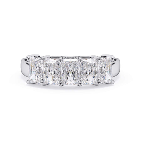 A picture of a five stone diamond wedding ring with radiant cut diamonds that are shared prong set in white gold or platinum on a white background with the ring facing forward, lying down.