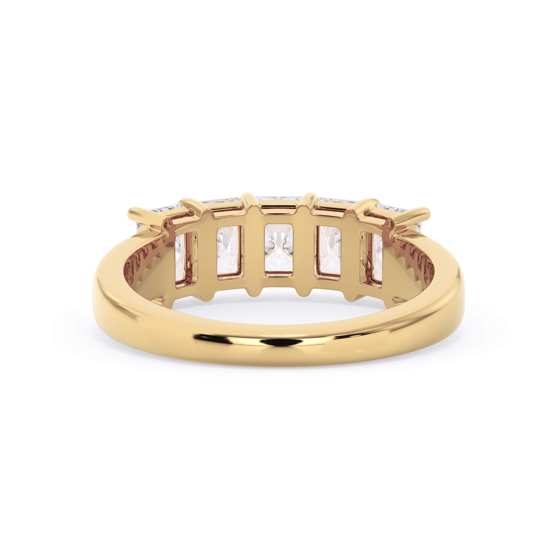 A picture of a five stone diamond wedding ring with radiant cut diamonds that are shared prong set in yellow gold on a white background with a view of the underside of the ring.