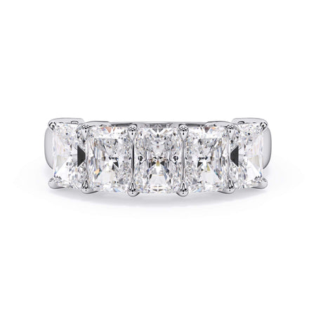 A picture of a five stone diamond wedding ring with radiant cut diamonds that are shared prong set in white gold or platinum on a white background with the ring facing forward, lying down.