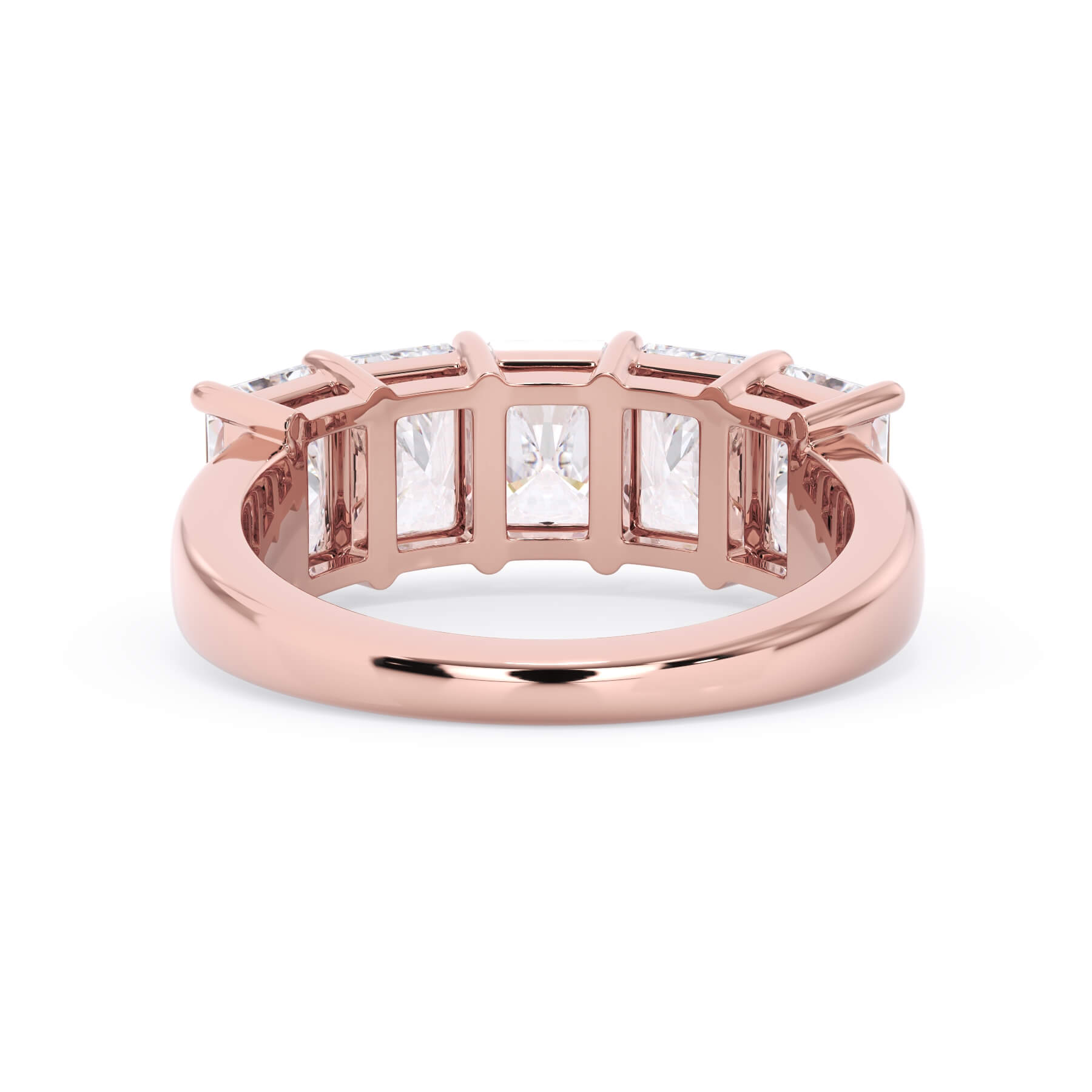 A picture of a five stone diamond wedding ring with radiant cut diamonds that are shared prong set in rose gold on a white background with a view of the underside of the ring.