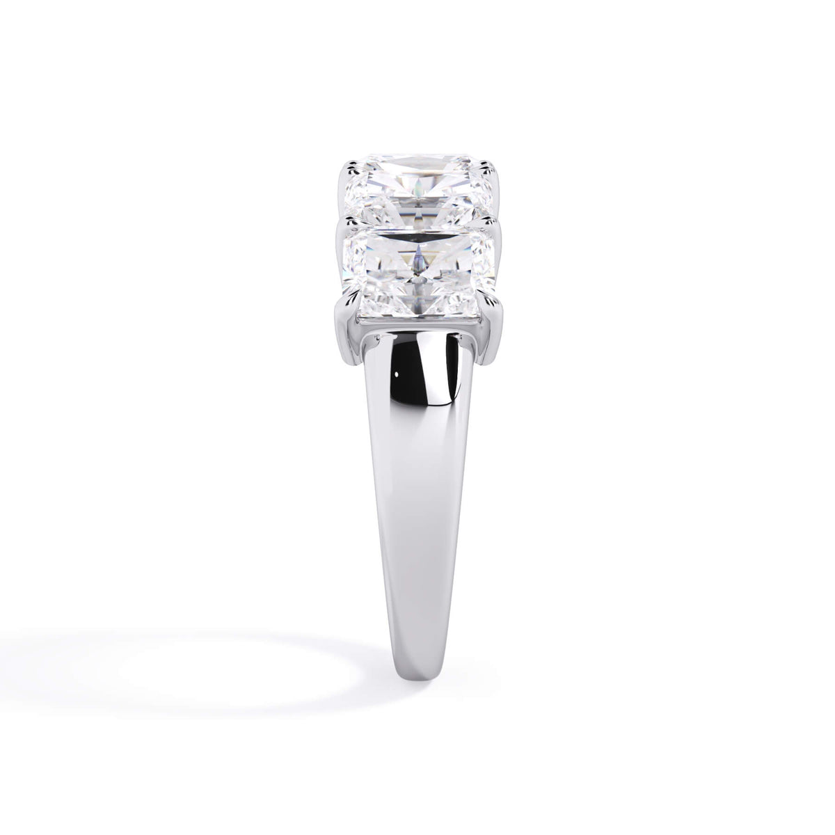 A picture of a five stone diamond wedding ring with radiant cut diamonds that are shared prong set in white gold or platinum on a white background with a side profile view.