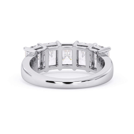 A picture of a five stone diamond wedding ring with radiant cut diamonds that are shared prong set in white gold or platinum on a white background with a view of the underside of the ring.