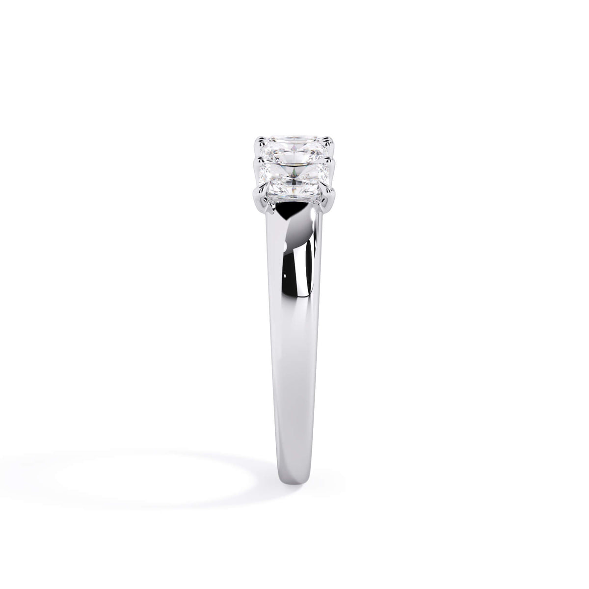 A picture of a five stone diamond wedding ring with radiant cut diamonds that are u prong set in white gold or platinum on a white background with a side profile view.