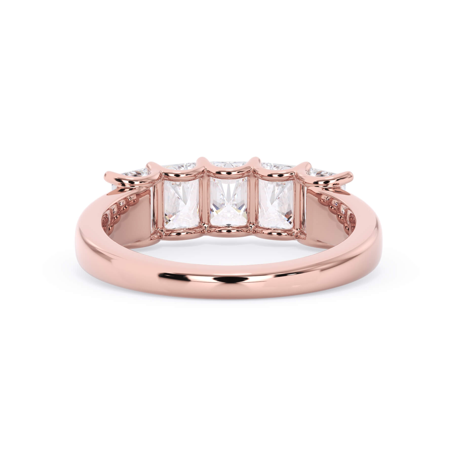 A picture of a five stone diamond wedding ring with radiant cut diamonds that are u prong set in rose gold on a white background with a view of the underside of the ring.