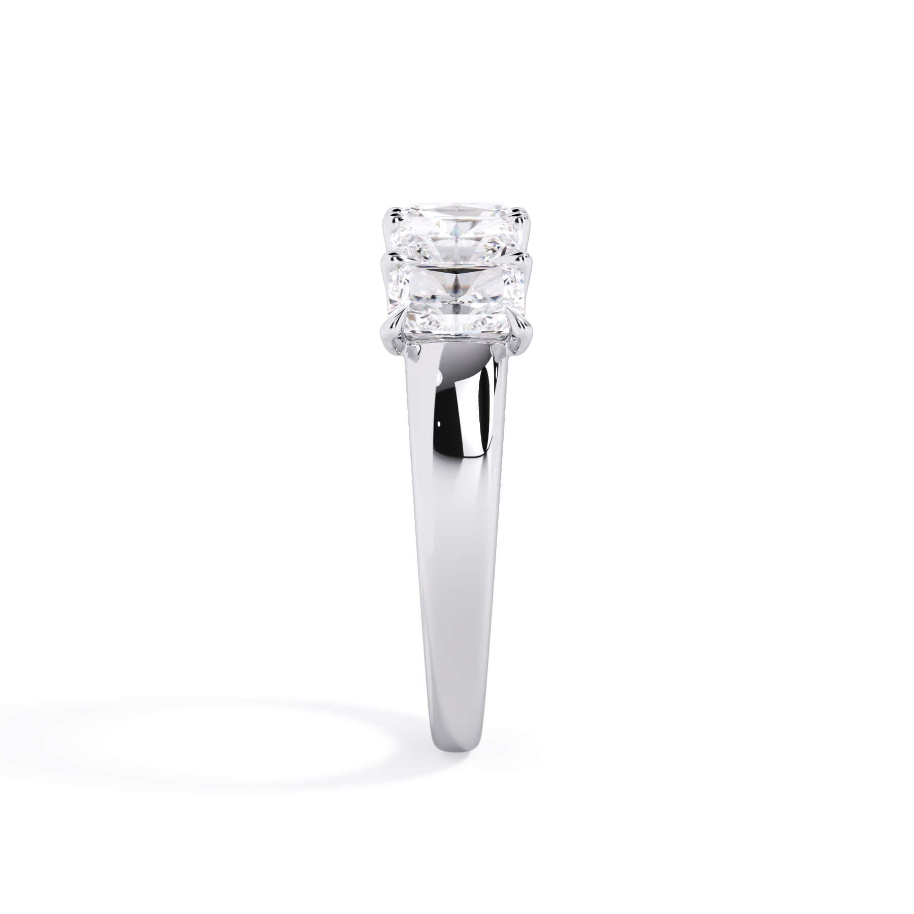 A picture of a five stone diamond wedding ring with radiant cut diamonds that are u prong set in white gold or platinum on a white background with a side profile view.