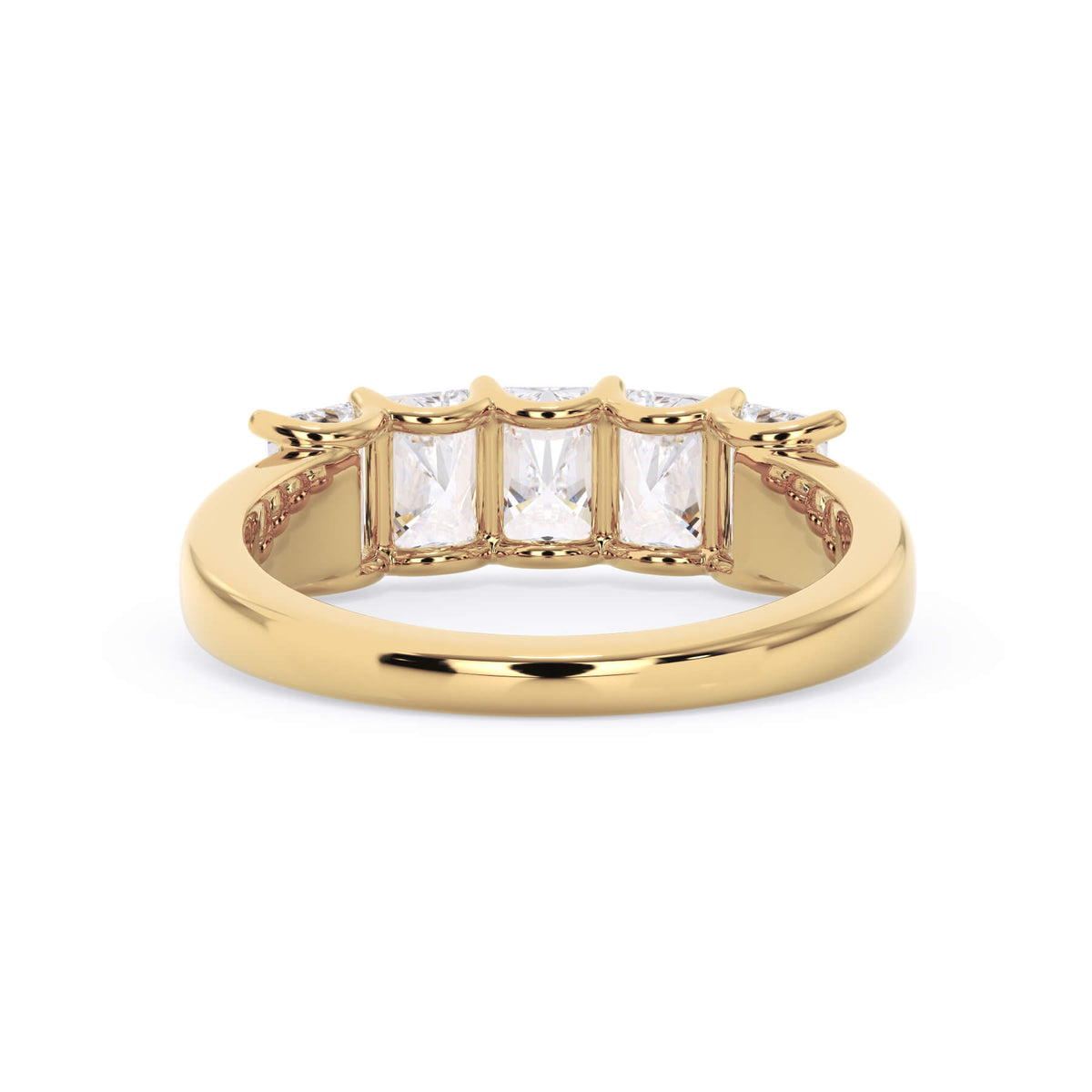 A picture of a five stone diamond wedding ring with radiant cut diamonds that are u prong set in yellow gold on a white background with a view of the underside of the ring.