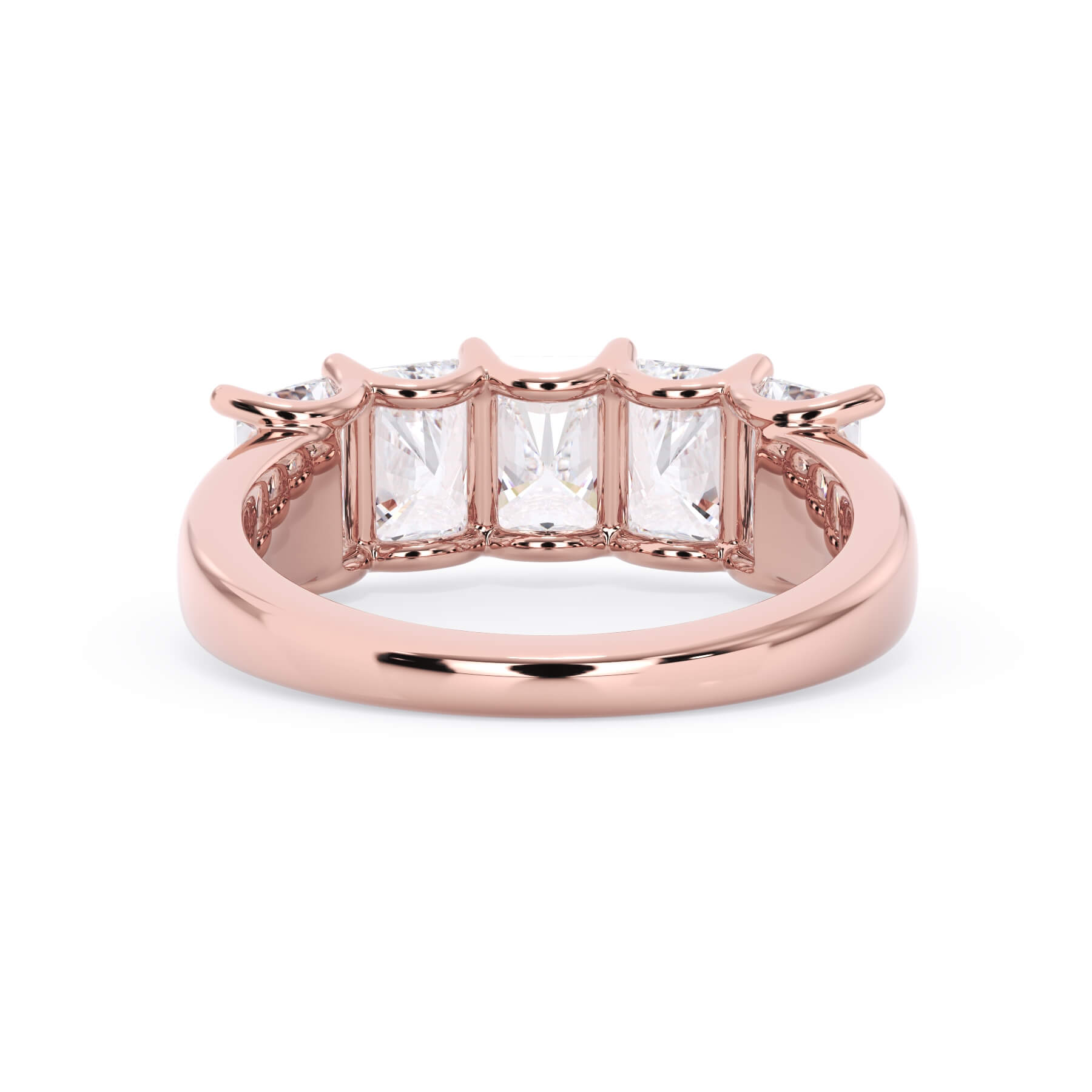 A picture of a five stone diamond wedding ring with radiant cut diamonds that are u prong set in rose gold on a white background with a view of the underside of the ring.