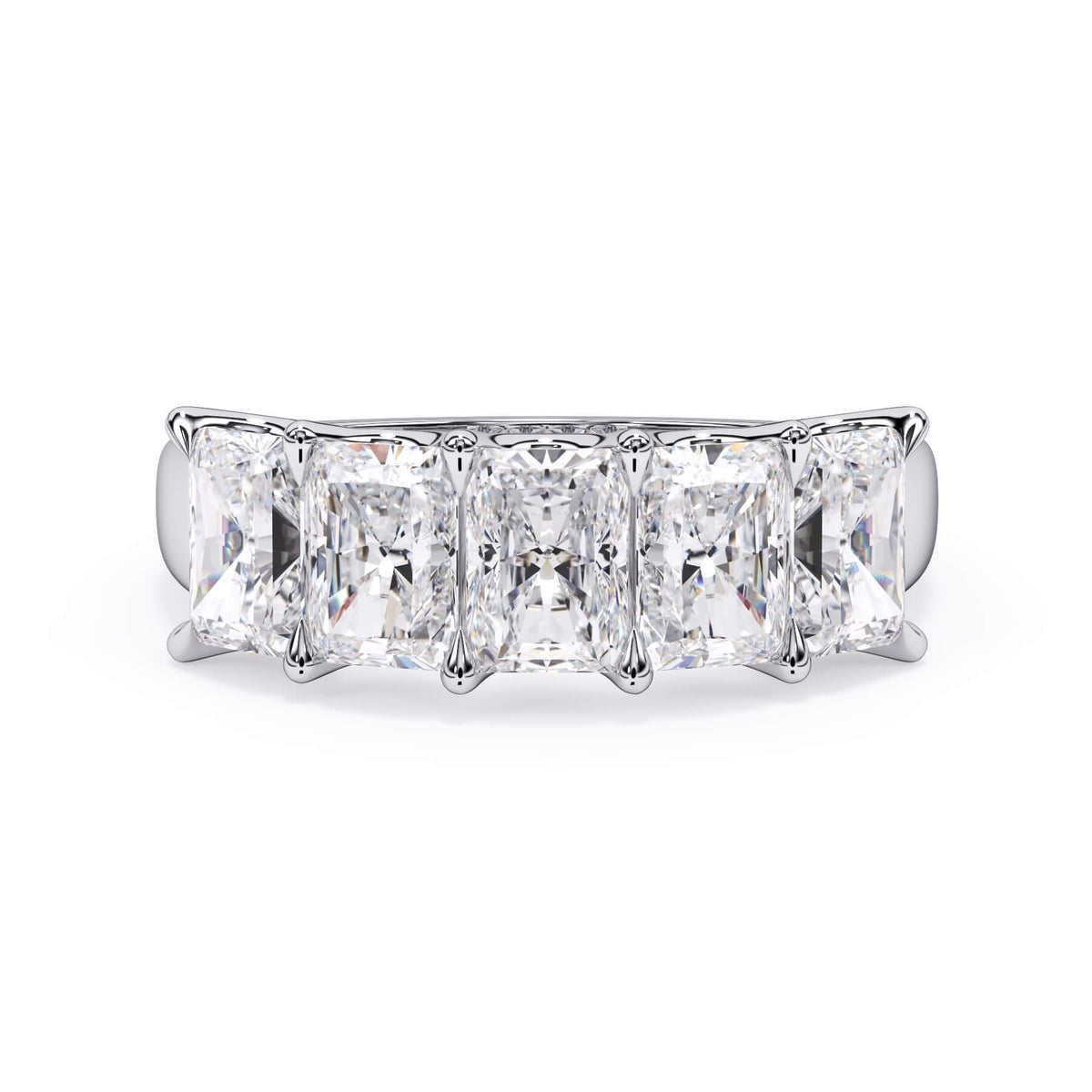 A picture of a five stone diamond wedding ring with radiant cut diamonds that are u prong set in white gold or platinum on a white background with the ring facing forward, lying down.