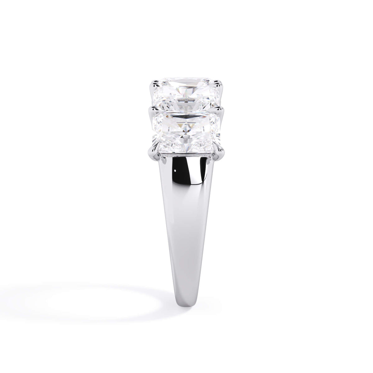 A picture of a five stone diamond wedding ring with radiant cut diamonds that are u prong set in white gold or platinum on a white background with a side profile view.