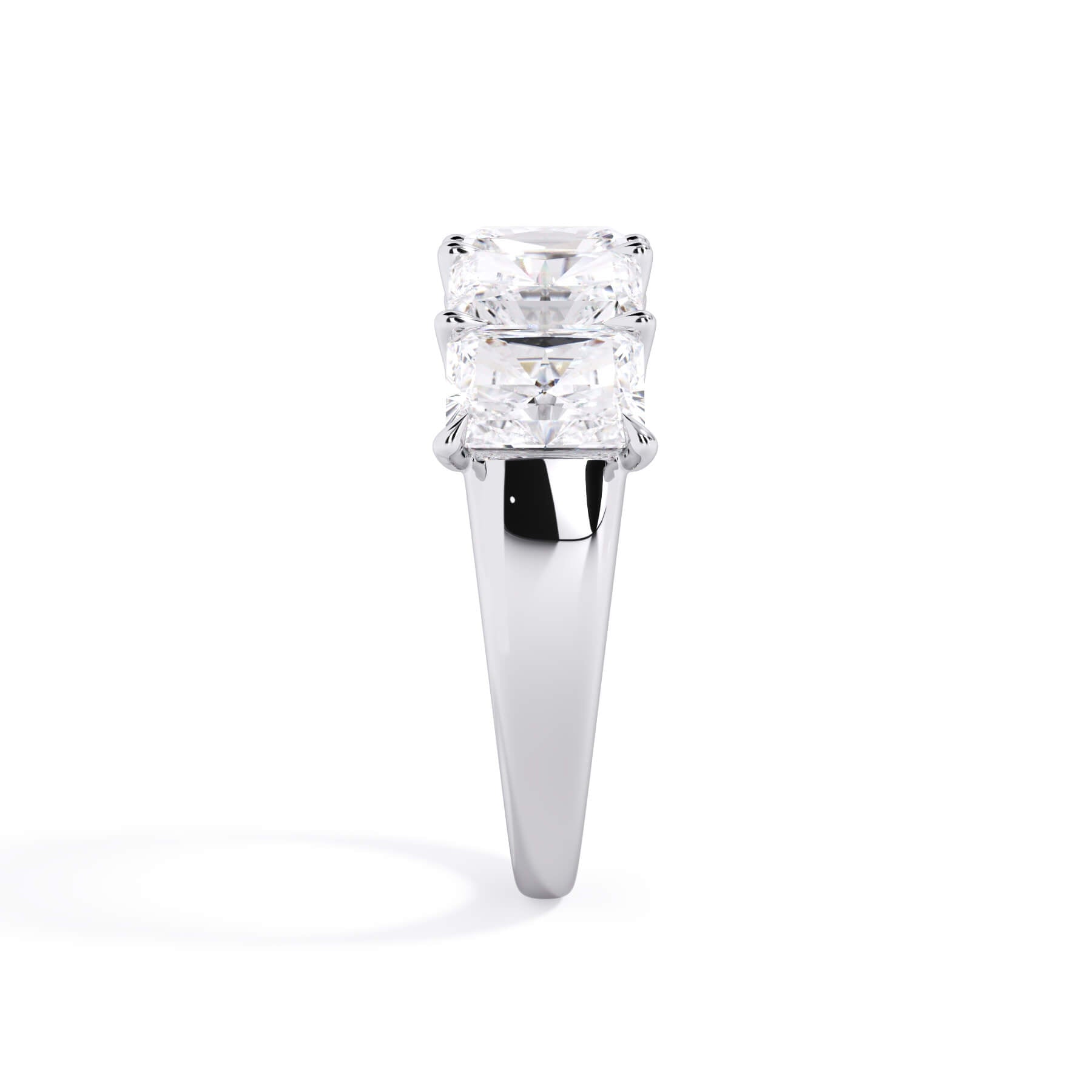 A picture of a five stone diamond wedding ring with radiant cut diamonds that are u prong set in white gold or platinum on a white background with a side profile view.