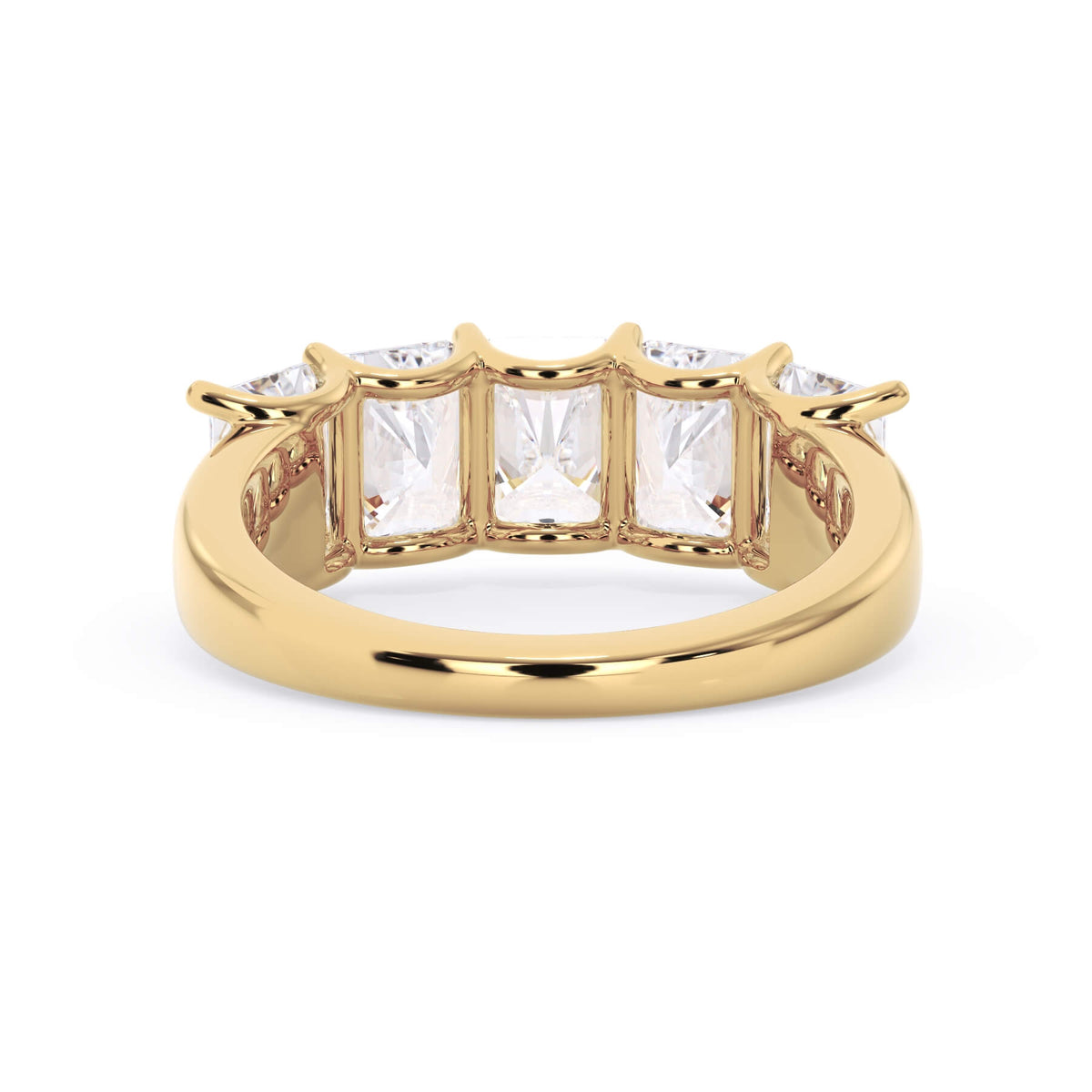 A picture of a five stone diamond wedding ring with radiant cut diamonds that are u prong set in yellow gold on a white background with a view of the underside of the ring.