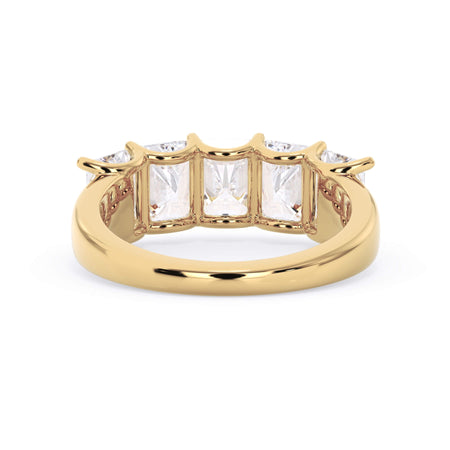 A picture of a five stone diamond wedding ring with radiant cut diamonds that are u prong set in yellow gold on a white background with a view of the underside of the ring.