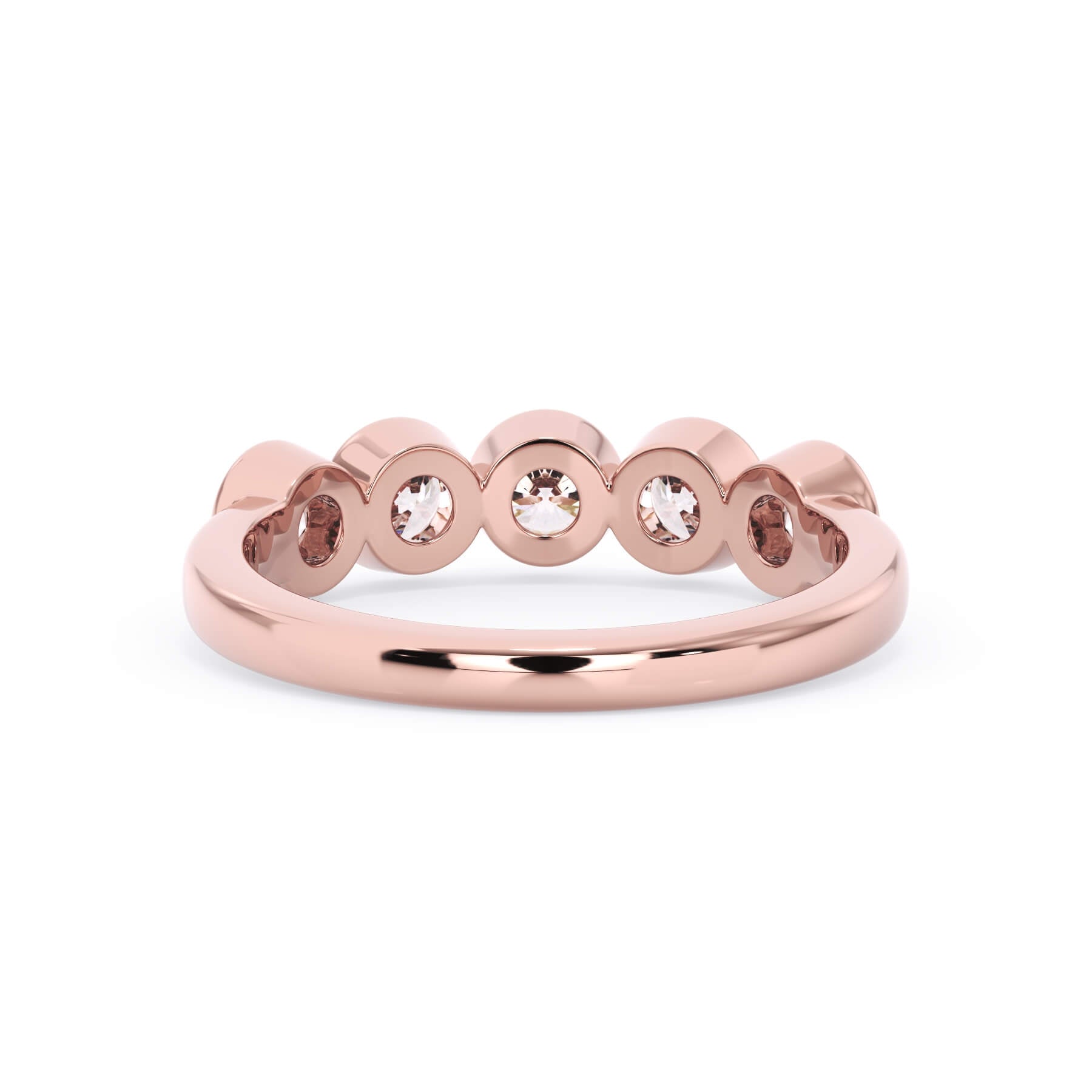 A picture of a five stone diamond wedding ring with round diamonds that are bezel set in rose gold on a white background with a view of the underside of the ring.