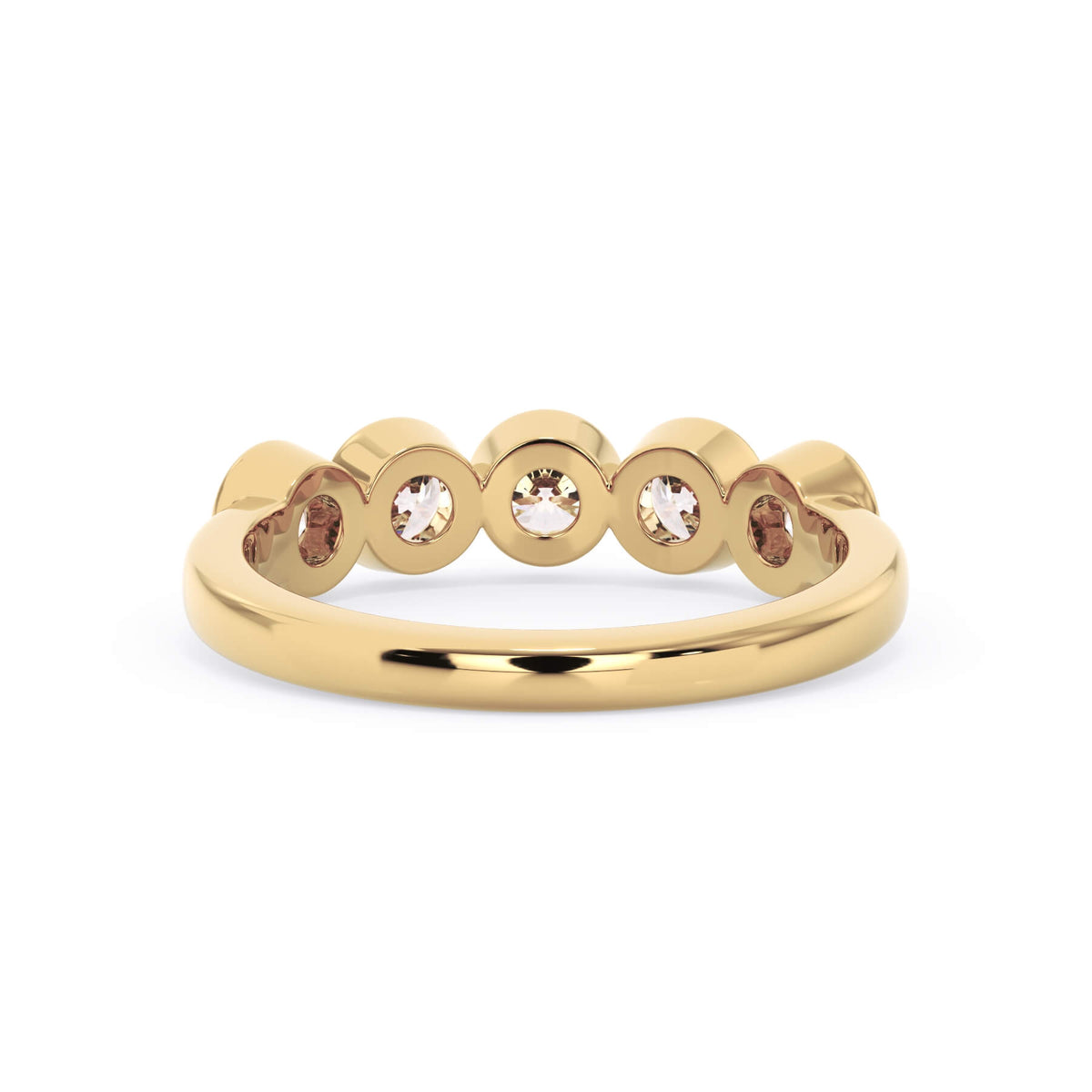 A picture of a five stone diamond wedding ring with round diamonds that are bezel set in yellow gold on a white background with a view of the underside of the ring.