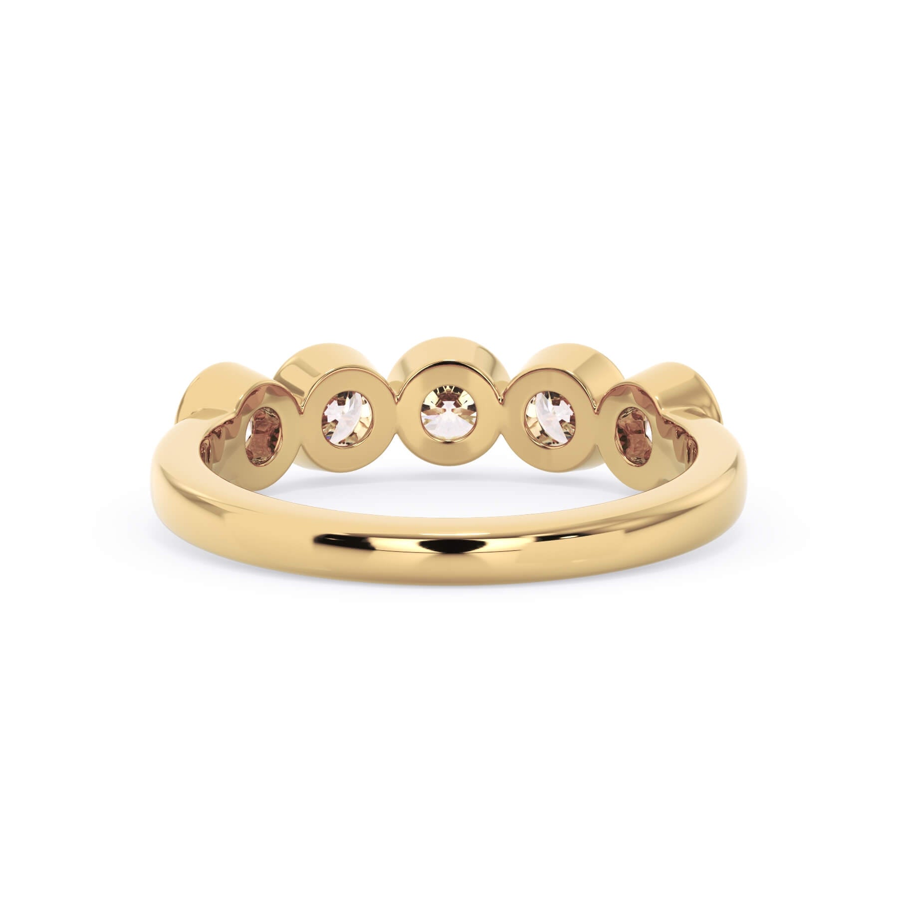 A picture of a five stone diamond wedding ring with round diamonds that are bezel set in yellow gold on a white background with a view of the underside of the ring.