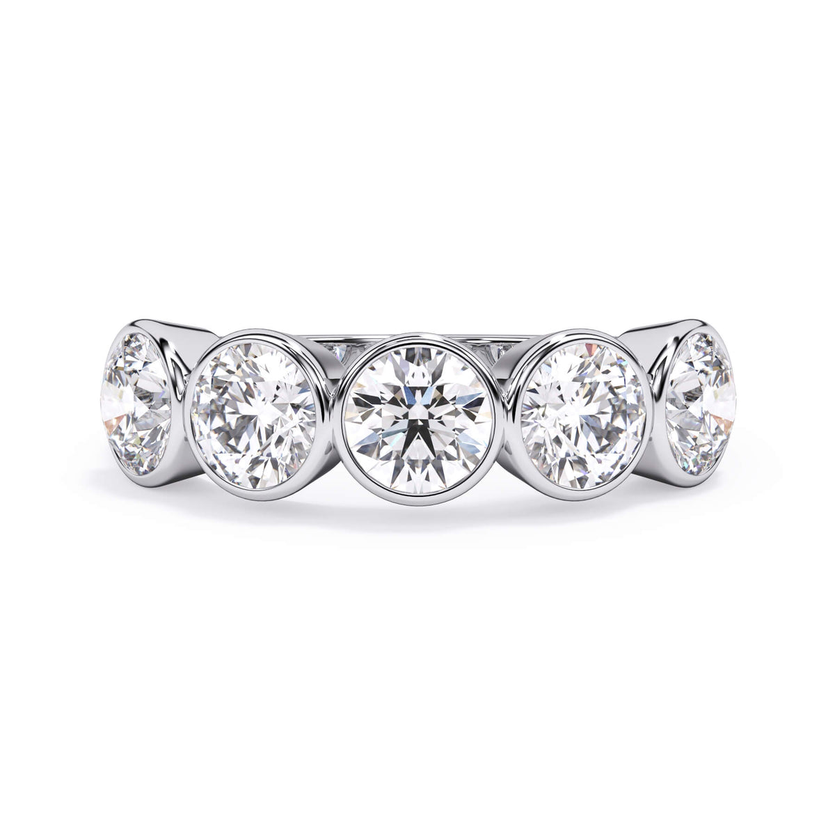 A picture of a five stone diamond wedding ring with round diamonds that are bezel set in white gold or platinum on a white background with the ring facing forward, lying down.