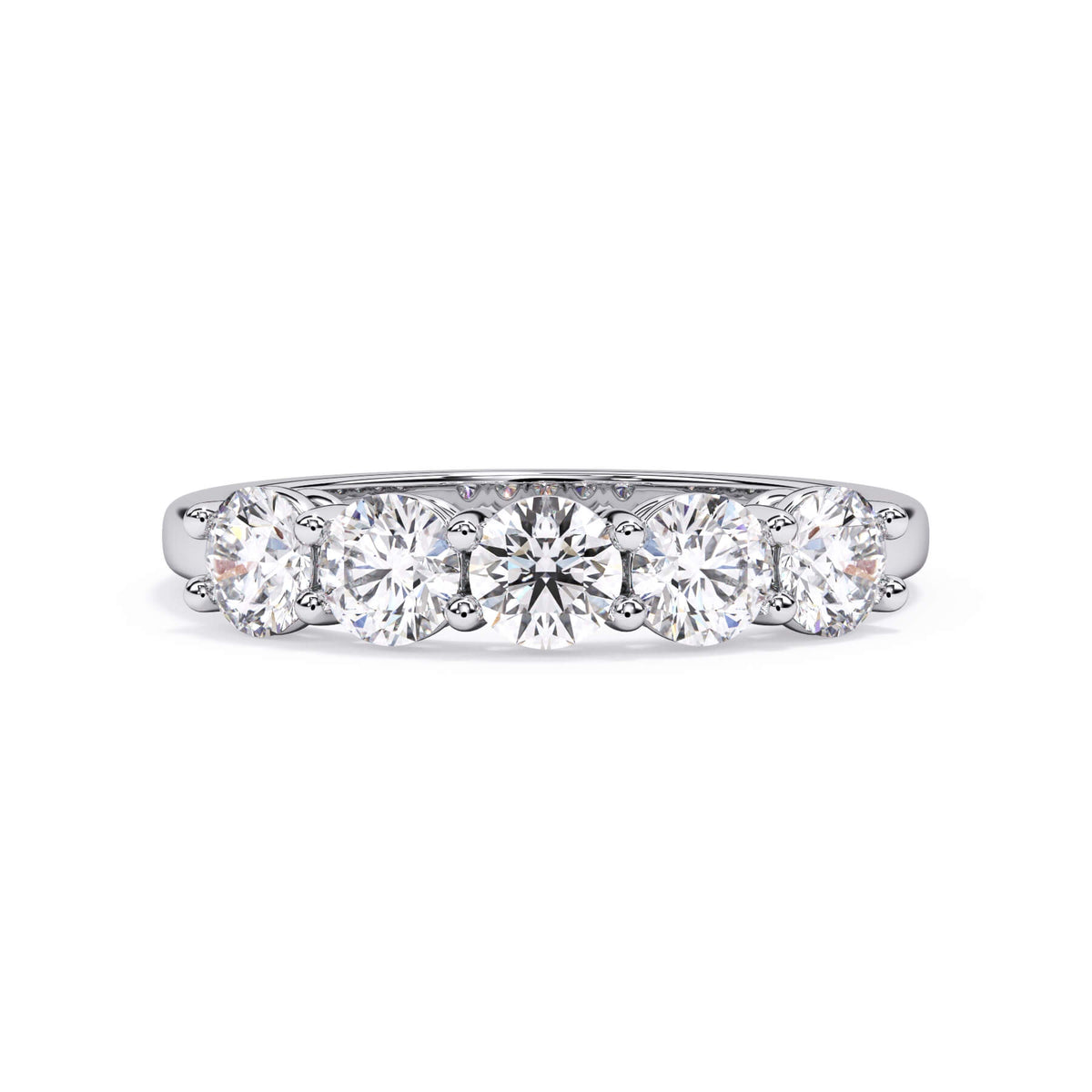 A picture of a five stone diamond wedding ring with round diamonds that are shared prong set in white gold or platinum on a white background with the ring facing forward, lying down.