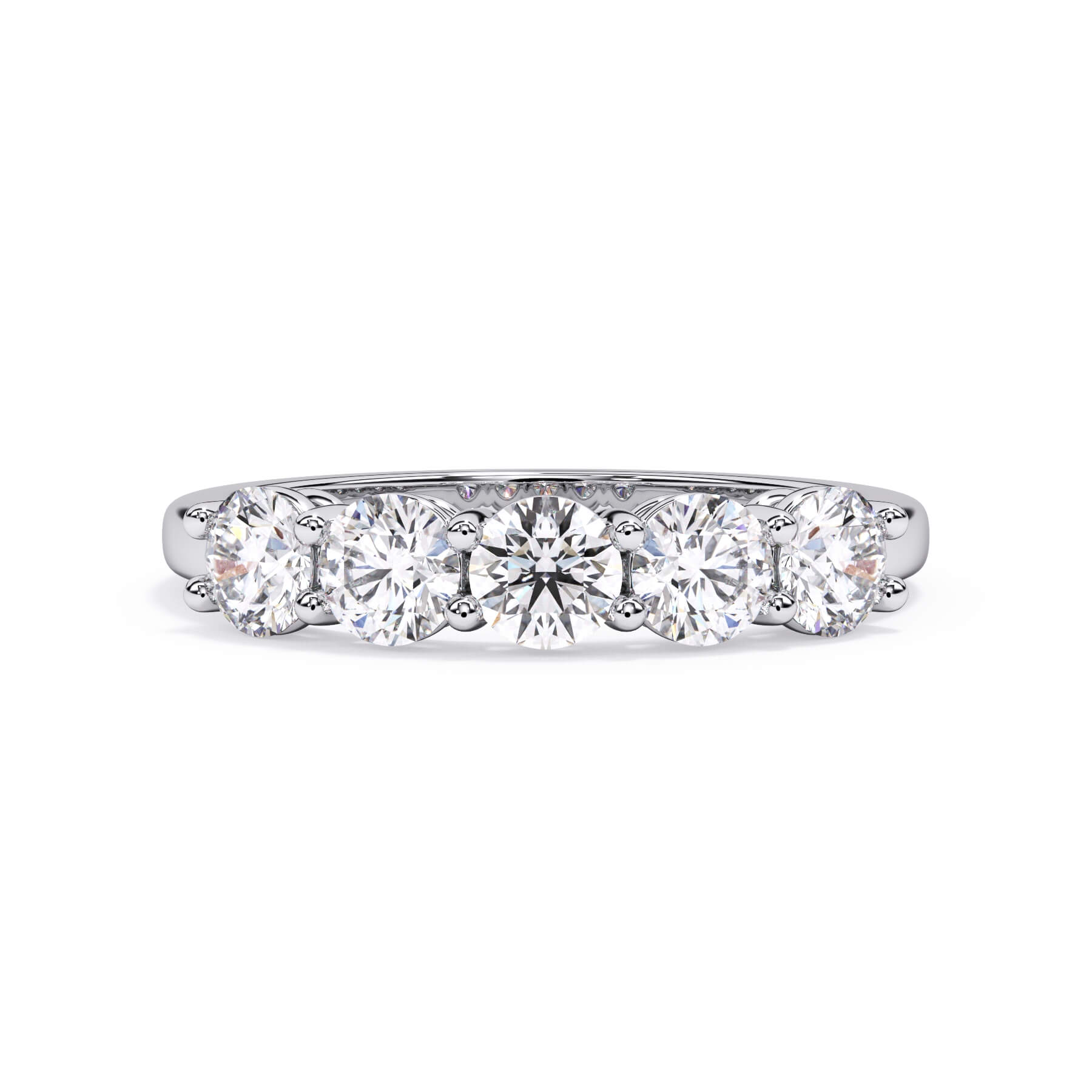 A picture of a five stone diamond wedding ring with round diamonds that are shared prong set in white gold or platinum on a white background with the ring facing forward, lying down.